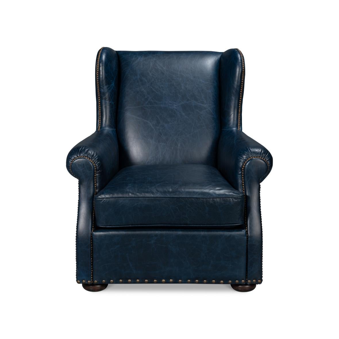 Featuring a high back design for ultimate support and rolled arms with intricate pleating detail, inviting you to a world of comfort with just one look. Wrapped in Chateau Blue leather, its rich color is the epitome of luxury, bound to add a touch