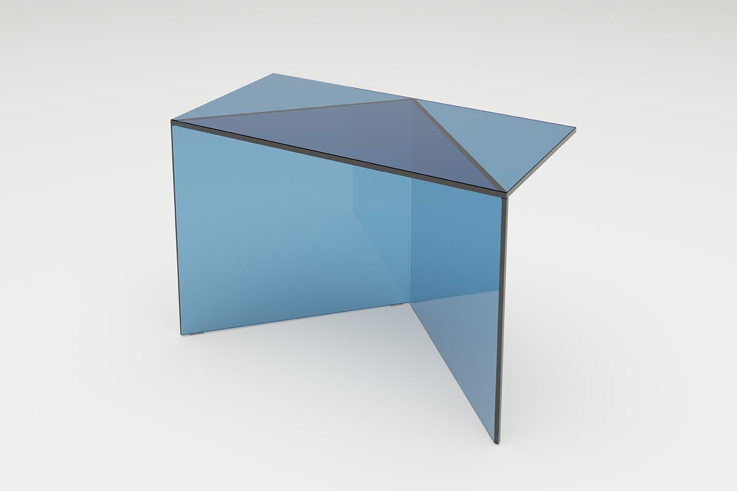 Blue glass poly square coffe table by Sebastian Scherer
Dimensions: D60 x W30 x H40 cm
Materials: Solid coloured glass.
Weight: 12.7 kg.
Also Available: Colours:Clear white (transparent) / clear green / clear blue / clear bronze / clear