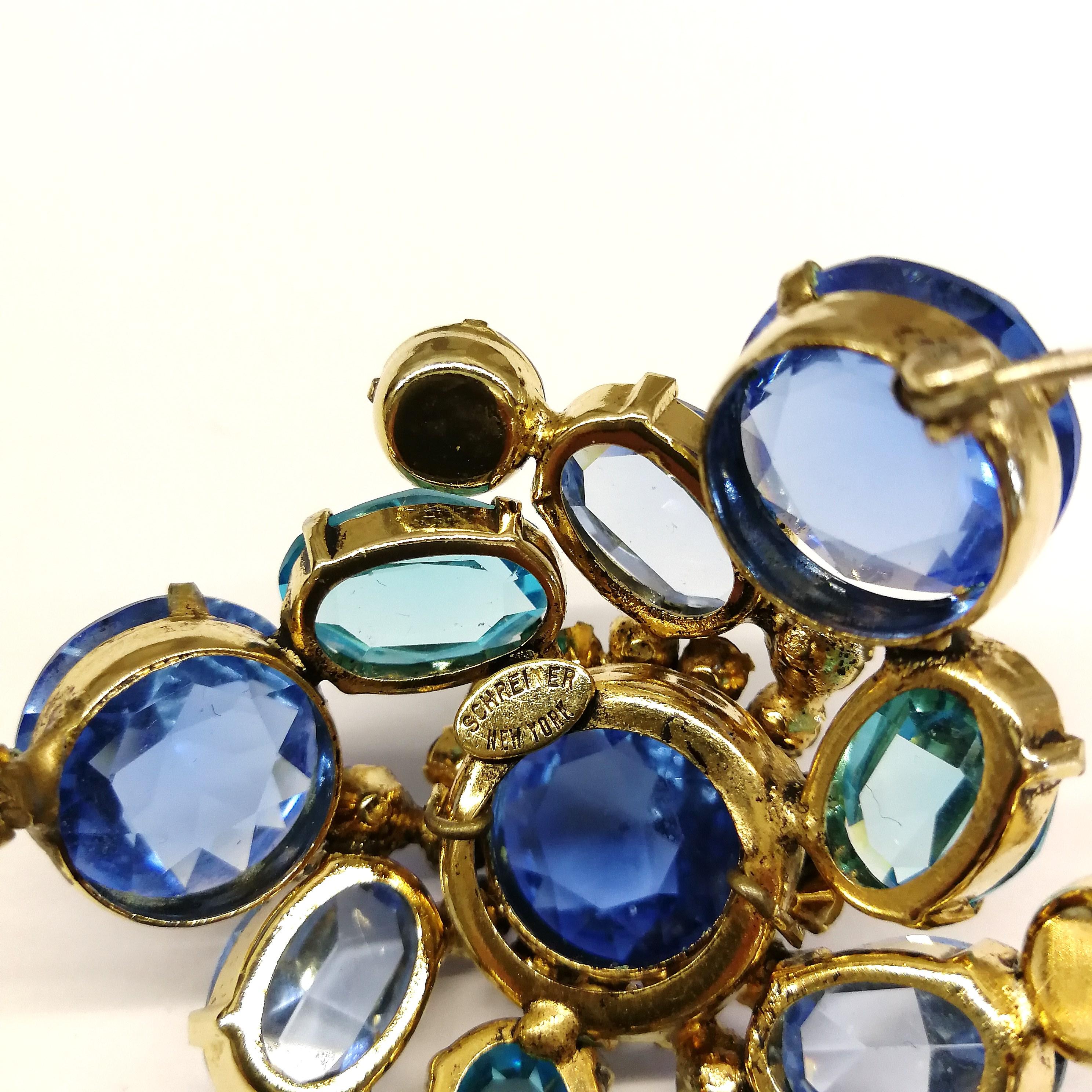 Blue clear pastes set in gilt metal 'cluster' brooch, Schreiner NY, 1960s 4