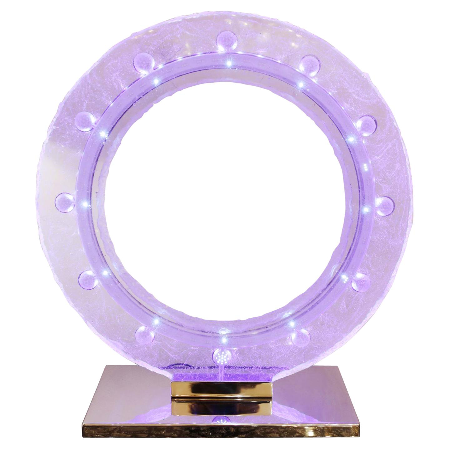 Blaue Uhr mit kristallgesteinenen LED- Dioden im Inneren