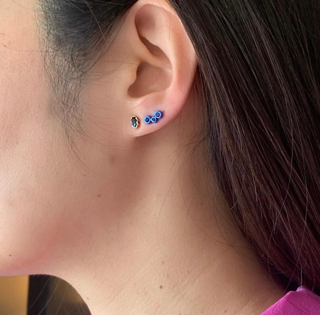Hi June Parker's mini version of her climber earrings, adding a pop of
electric Blue to your ears with this 3-stone SINGLE stud.

Inspired by seeing the cross-section view of life, as if slicing a tree to see its underlying structure and raw beauty,