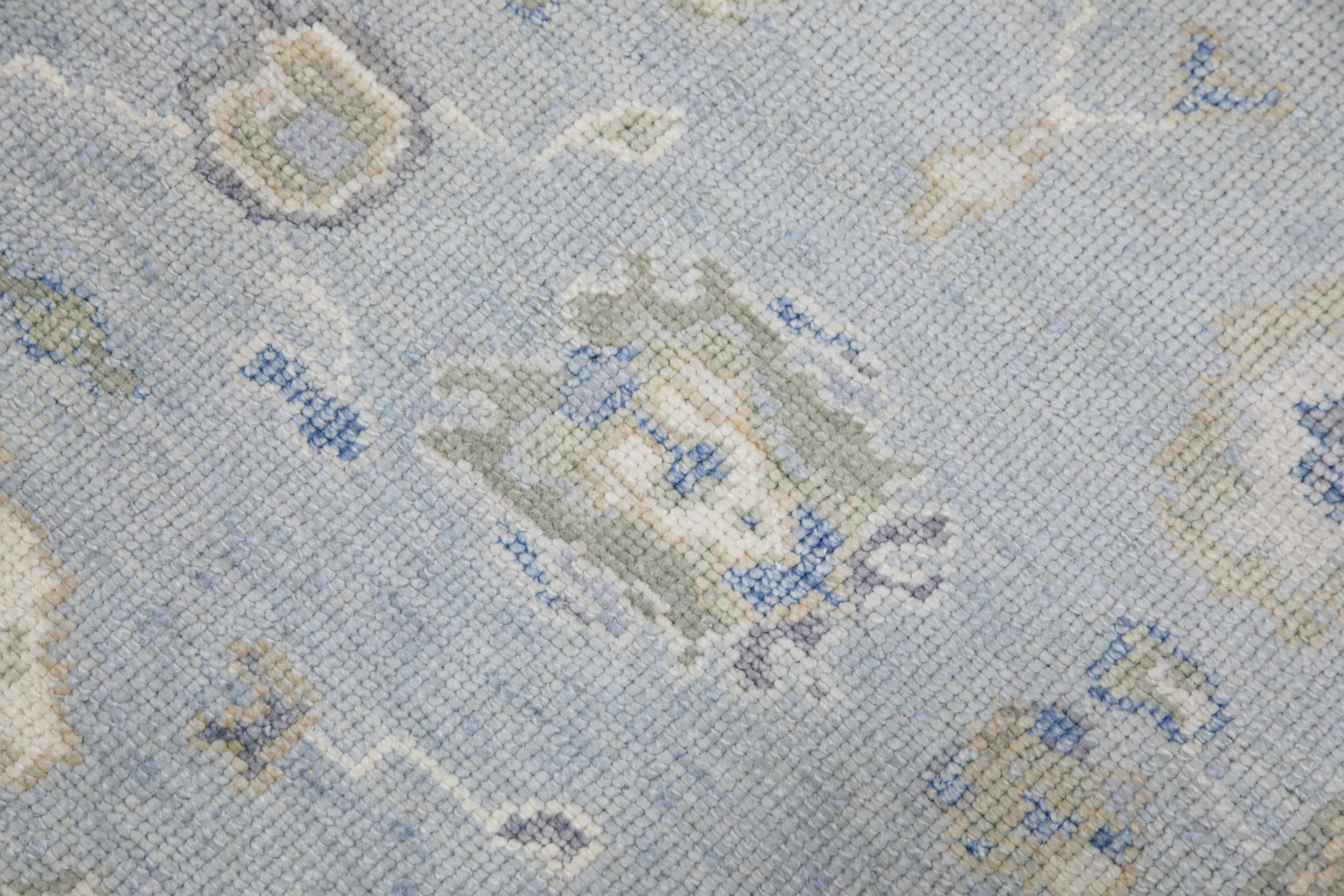 Tappeto Oushak turco in lana intrecciata a mano con design floreale blu e colorato 5' X 9'6