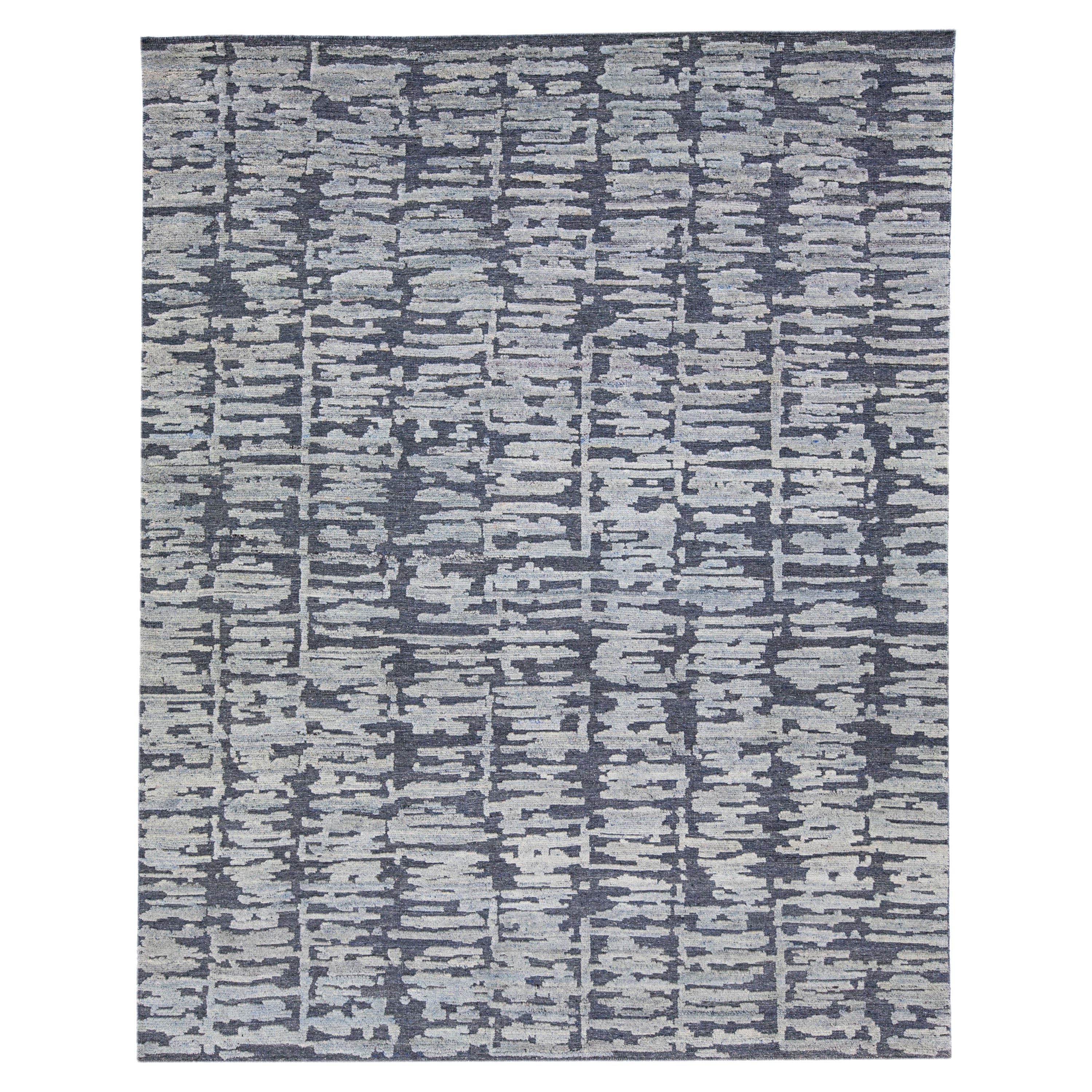 Tappeto Berwyn contemporaneo blu in lana con struttura a mano