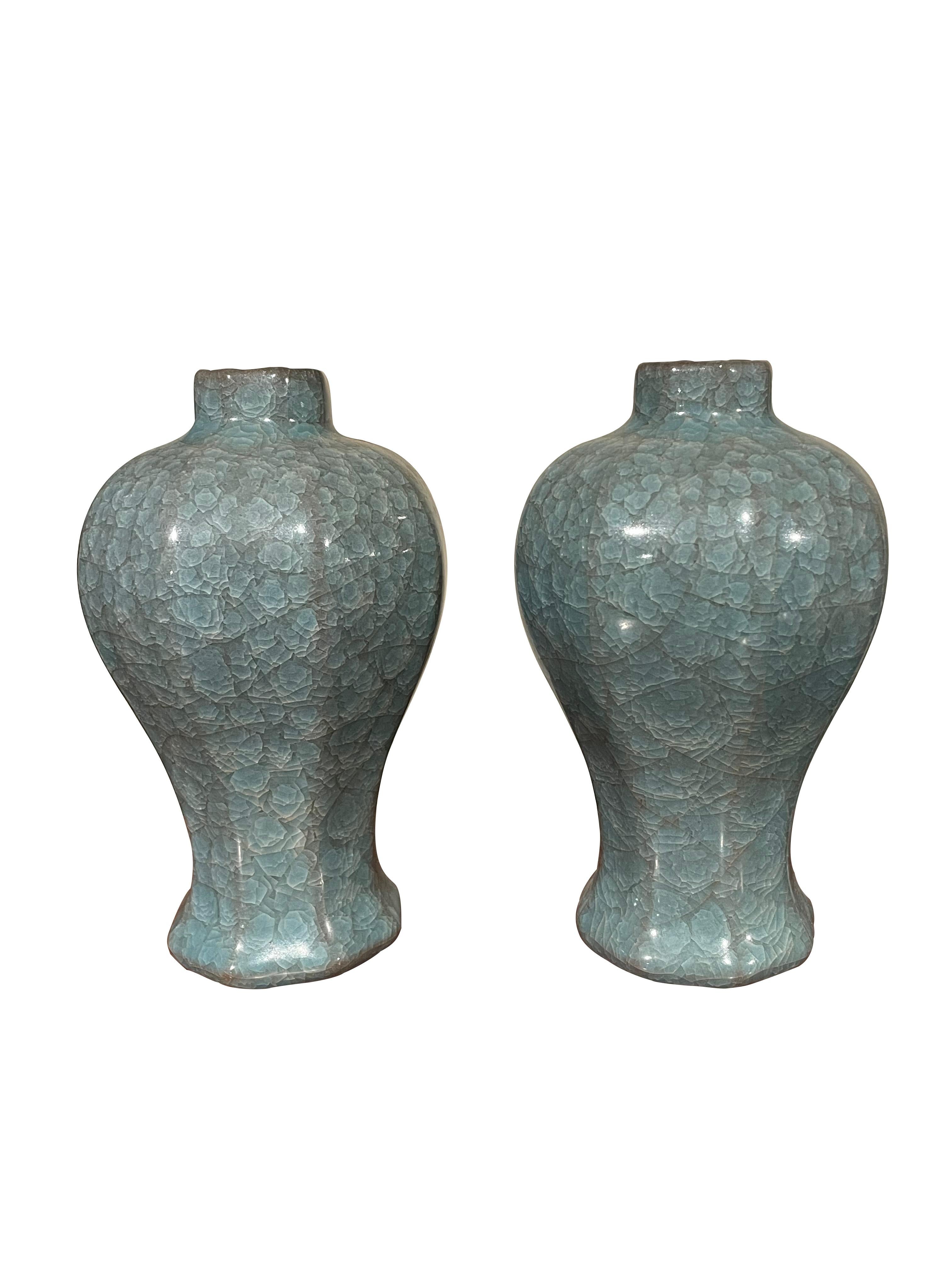 Contemporary Chinese blue vase with crackle glaze.
Hexagonal shape with small spout opening.
Two available and sold individually.
From a large collection with varying shapes and sizes.
ARRIVING APRIL