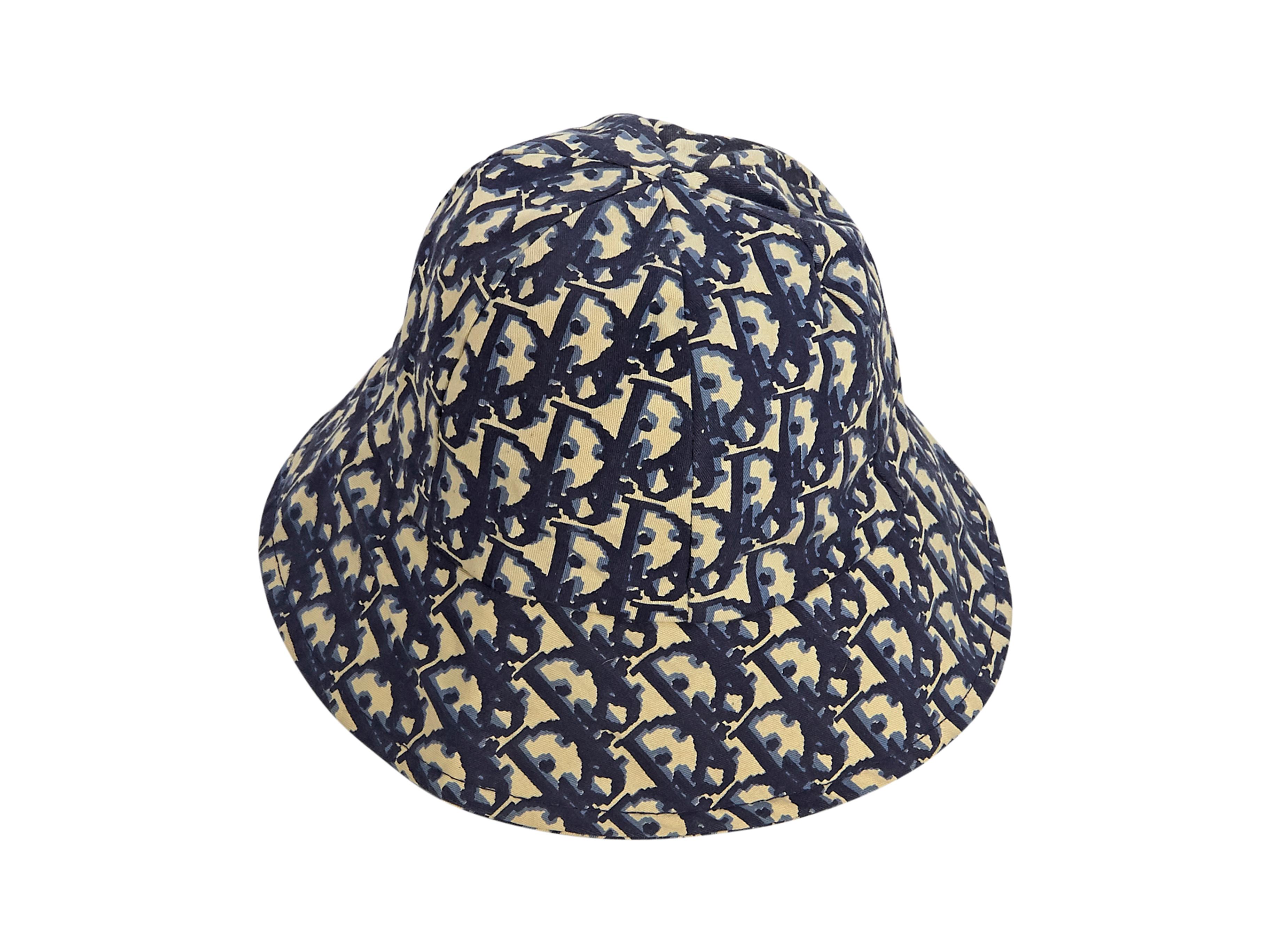 Product details:  Blue and cream monogram bucket hat by Christian Dior.  Water repellent design.  Lined interior.  25.25