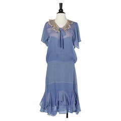 Blue crêpe top-stitched dress with crochet collar, bow and ruffles Circa 1925's 