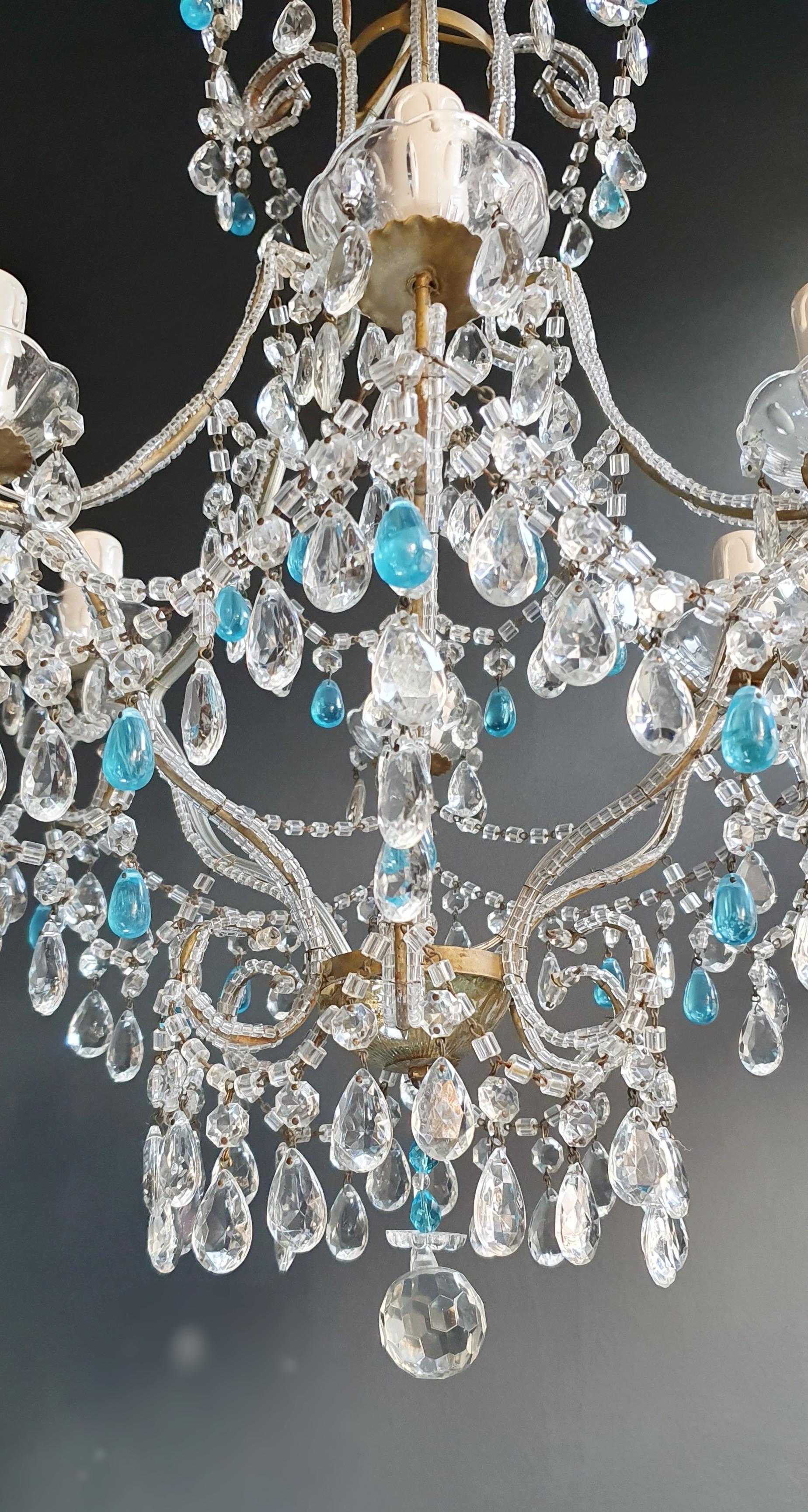 Blue crystal chandelier antique ceiling Murano Florentiner lustre Art Nouveau

Measures: Total height 90 cm, height without chain 70 cm, diameter 44 cm. Weight (approximately) 5 kg.

Number of lights: 6 light bulb sockets: E14 material: Iron,
