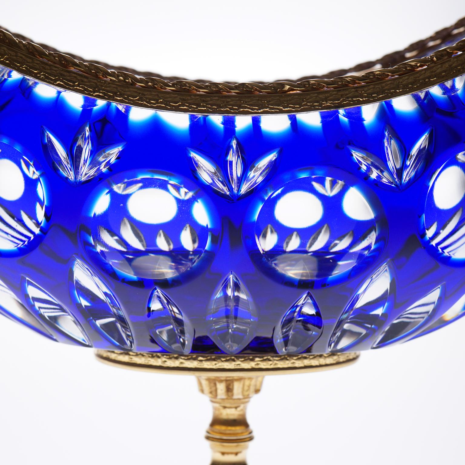 Gorgeous blue crystal and bronze jardinière product by Cristallerie de Montbronn, embellished with 22-carats gold on the top and foot.

This item is perfect for either flowers amateurs or simply people who want to enhance their already tasty