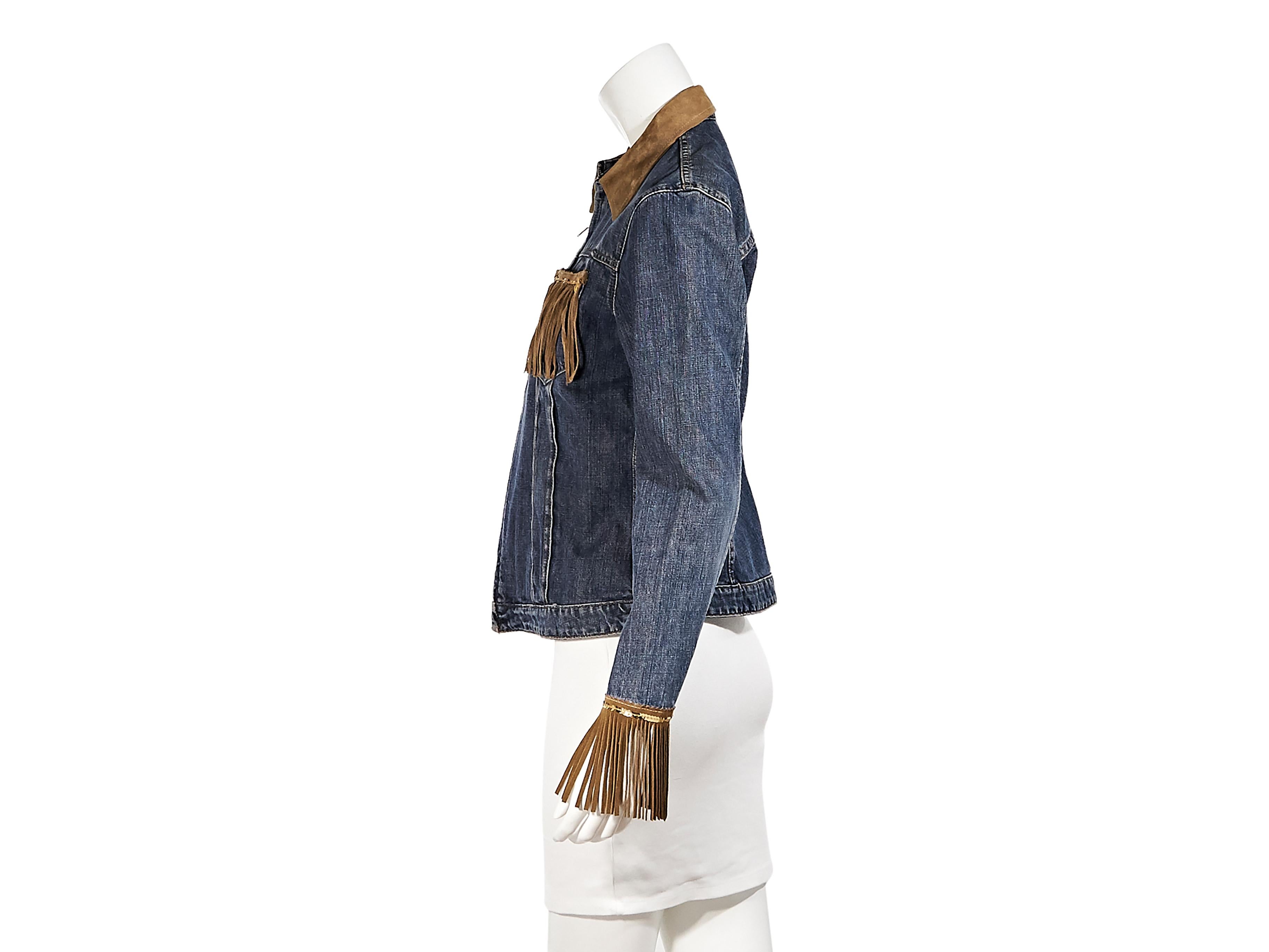 Product details:  Blue western jean jacket by D&G.  Circa the 2000s.  Spread collar.  Long sleeves.  Fringe cuffs.  Zip-front closure.  Chest patch pockets accented with suede fringe and sequins.  32
