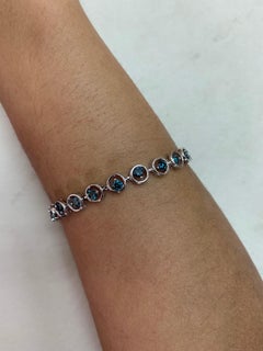 Blue Diamond Bracelet in 14 Karat White Gold