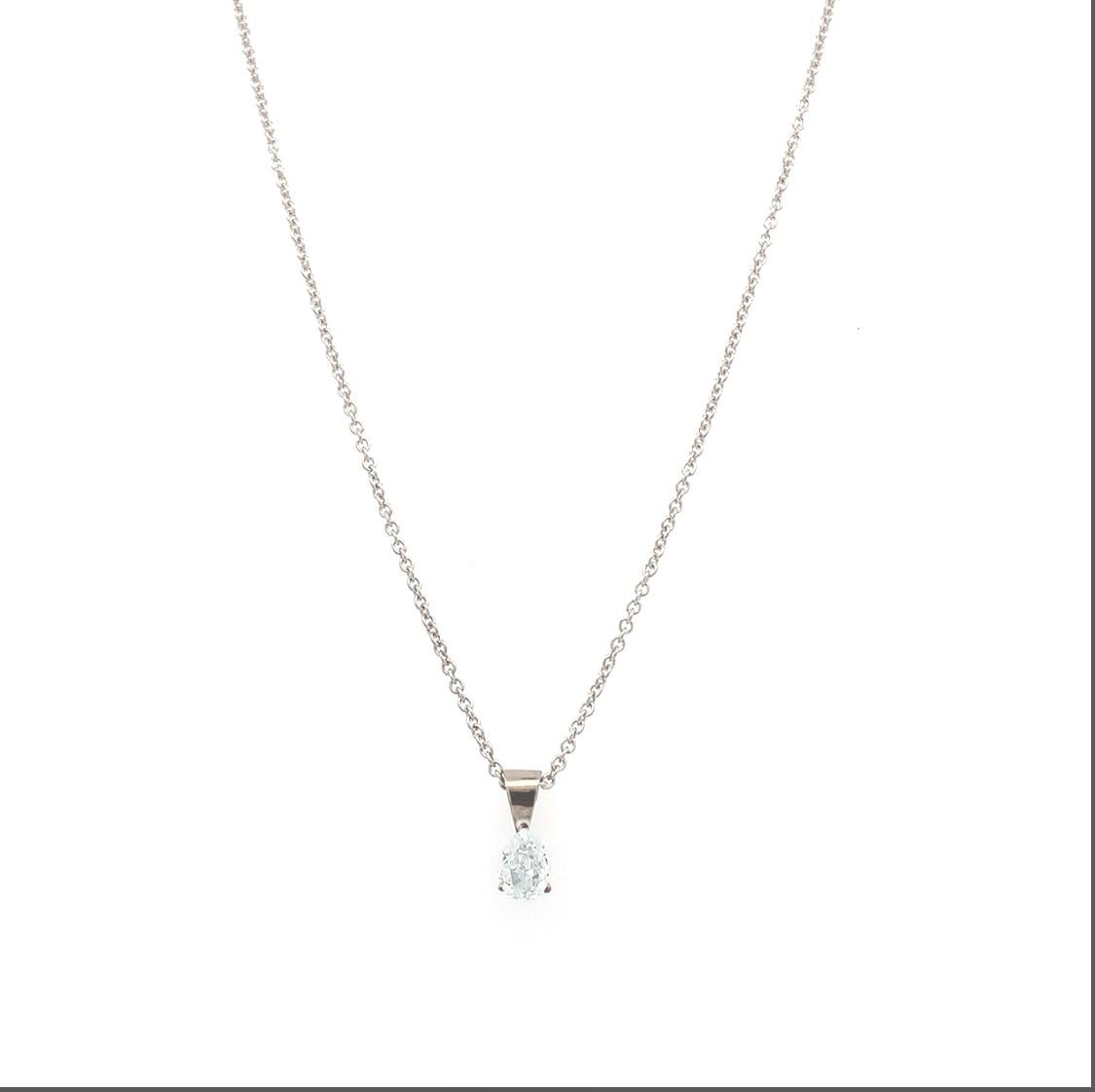 Discover the timeless beauty of this elegant blue sky pear-shaped diamond solitaire pendant necklace 18k white gold. Crafted with precision in 18k white gold, the stunning light blue diamond GIA certified total weight 0.31ct SI1 clarity is set in a
