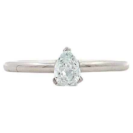 Blue diamond pear shaped solitaire engagement ring 18k white gold