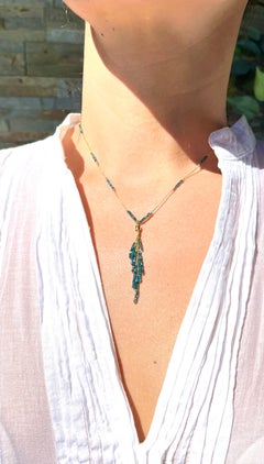 Halskette aus 18 Karat Gelbgold mit blauem Diamanten und Quaste