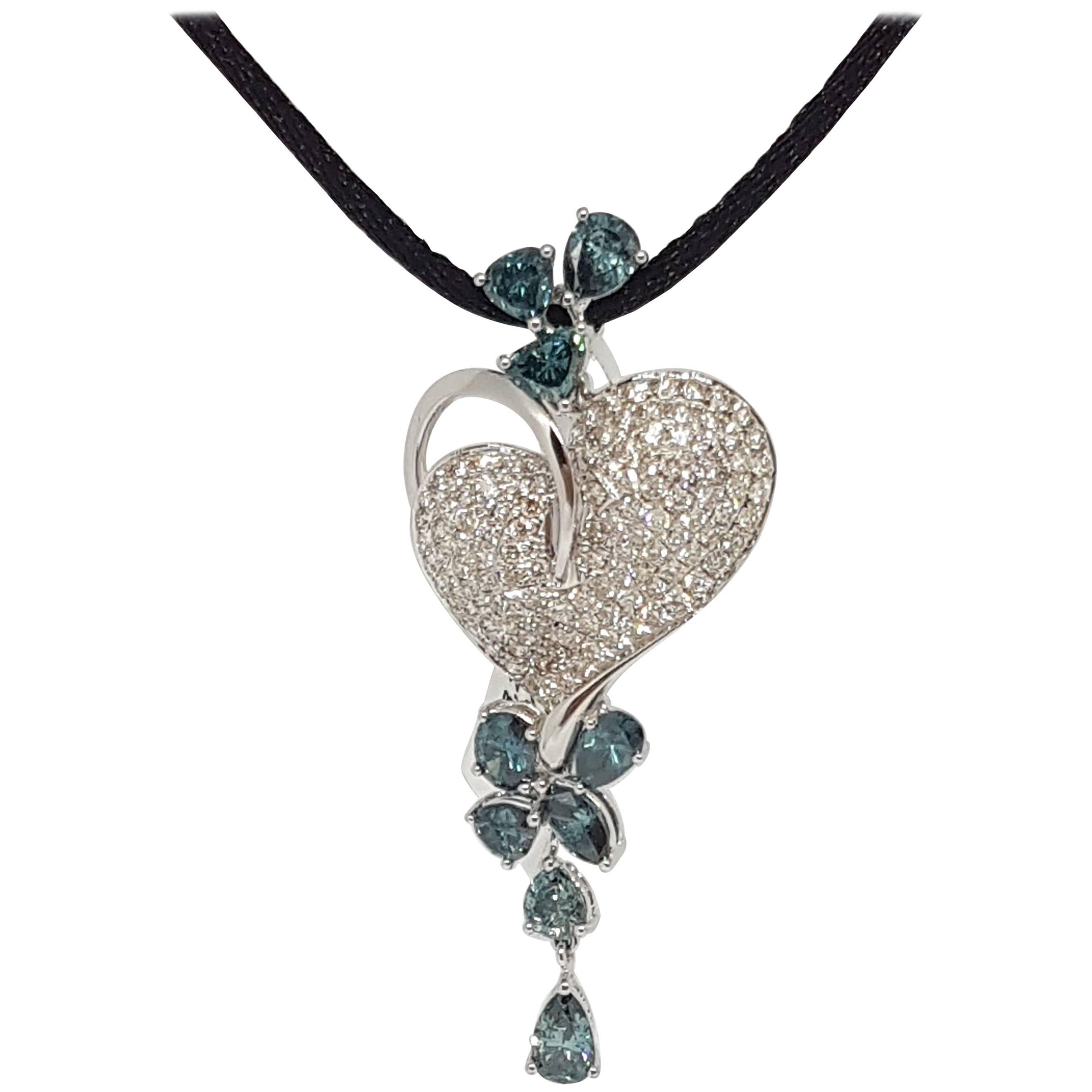Blue Diamonds Hanging in Heart shape Necklace in White Gold