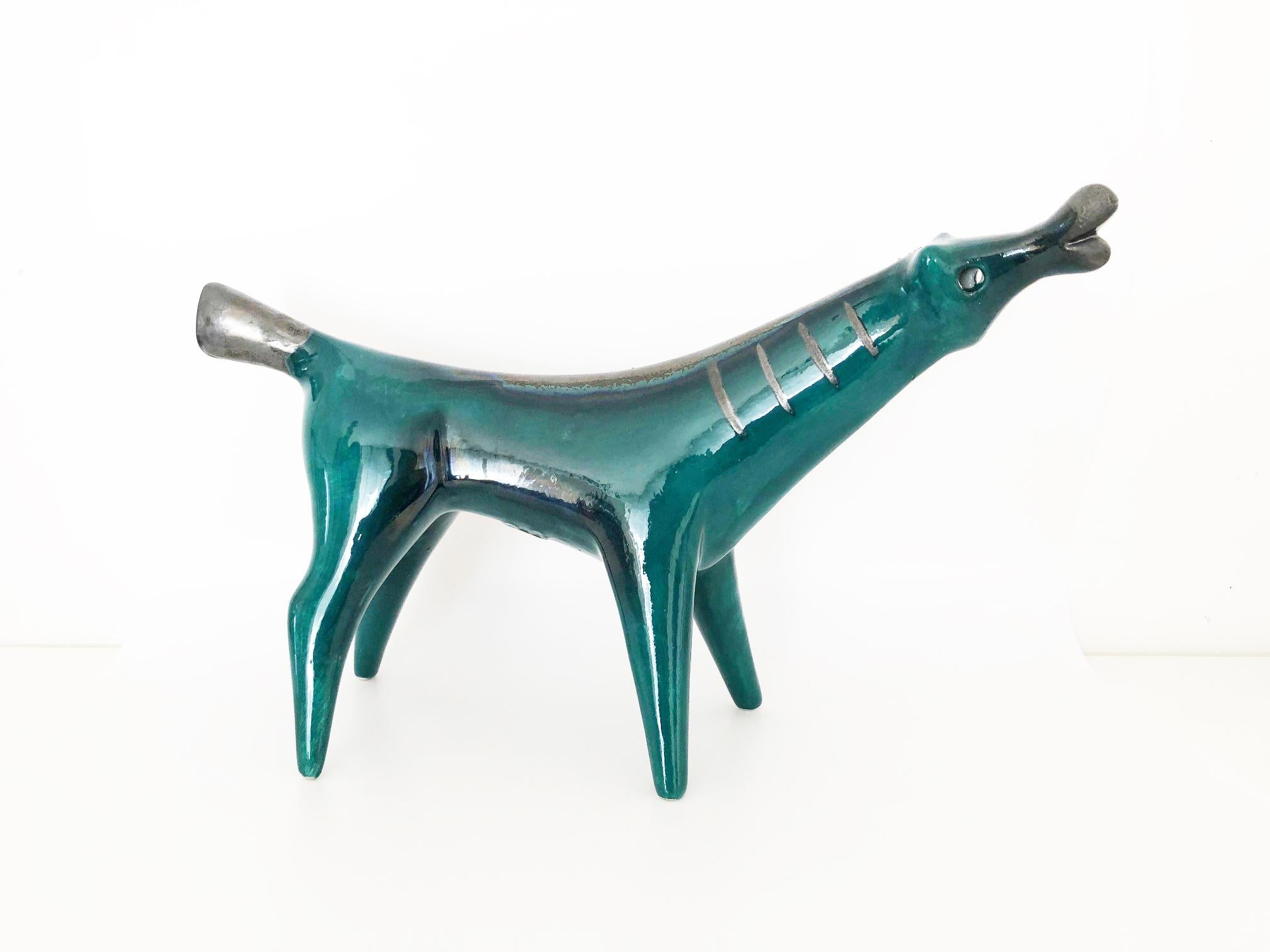 Blue Dog of Roberto Rigon Made in Italy - Art -

Year: 1950s

Materials: Signed and glazed ceramic, green 

Conditions: Perfect

Measurements: Cm 30 x cm 20


