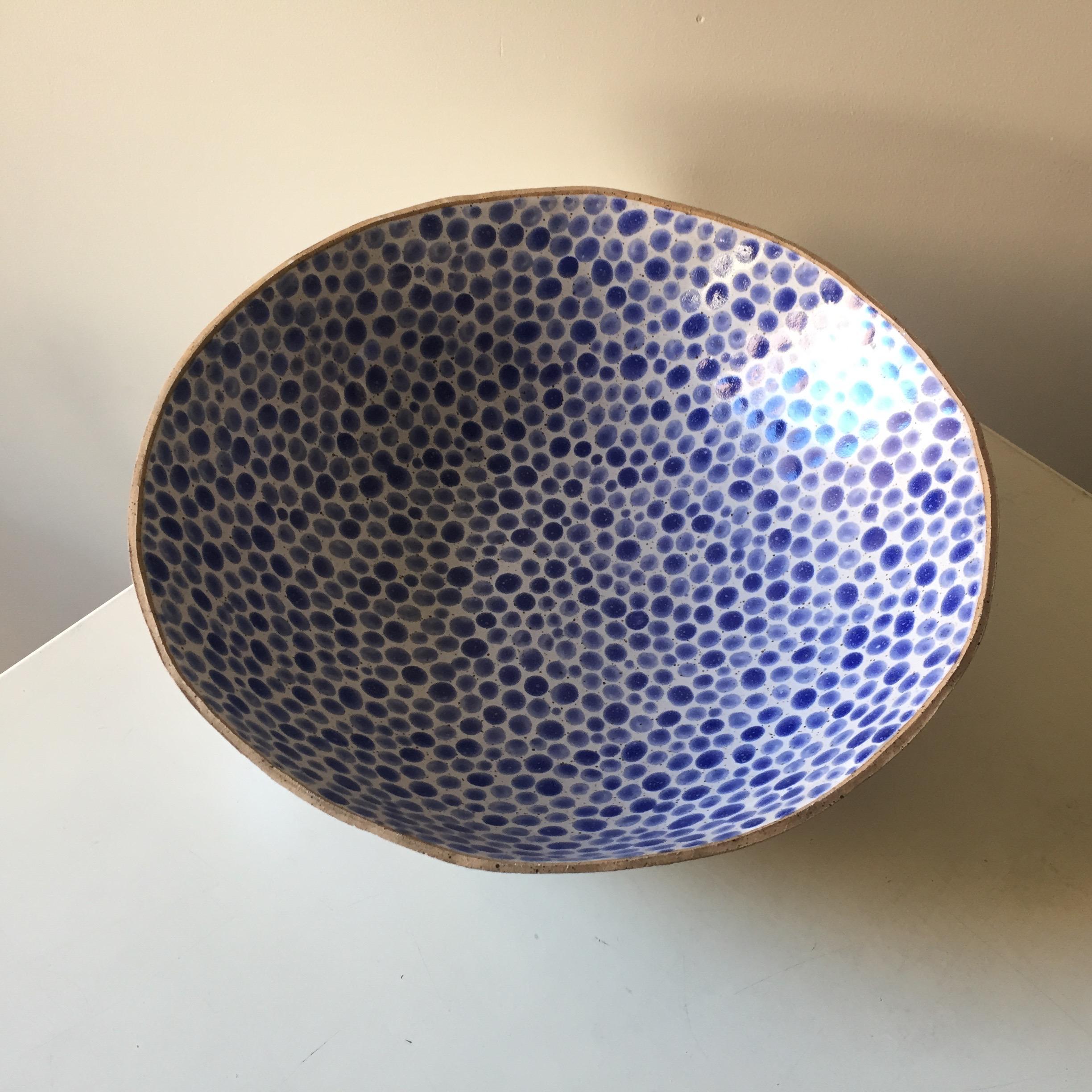Stoneware bowl hand painted with blue glaze. Made in Tribeca NYC by Lana Kova.