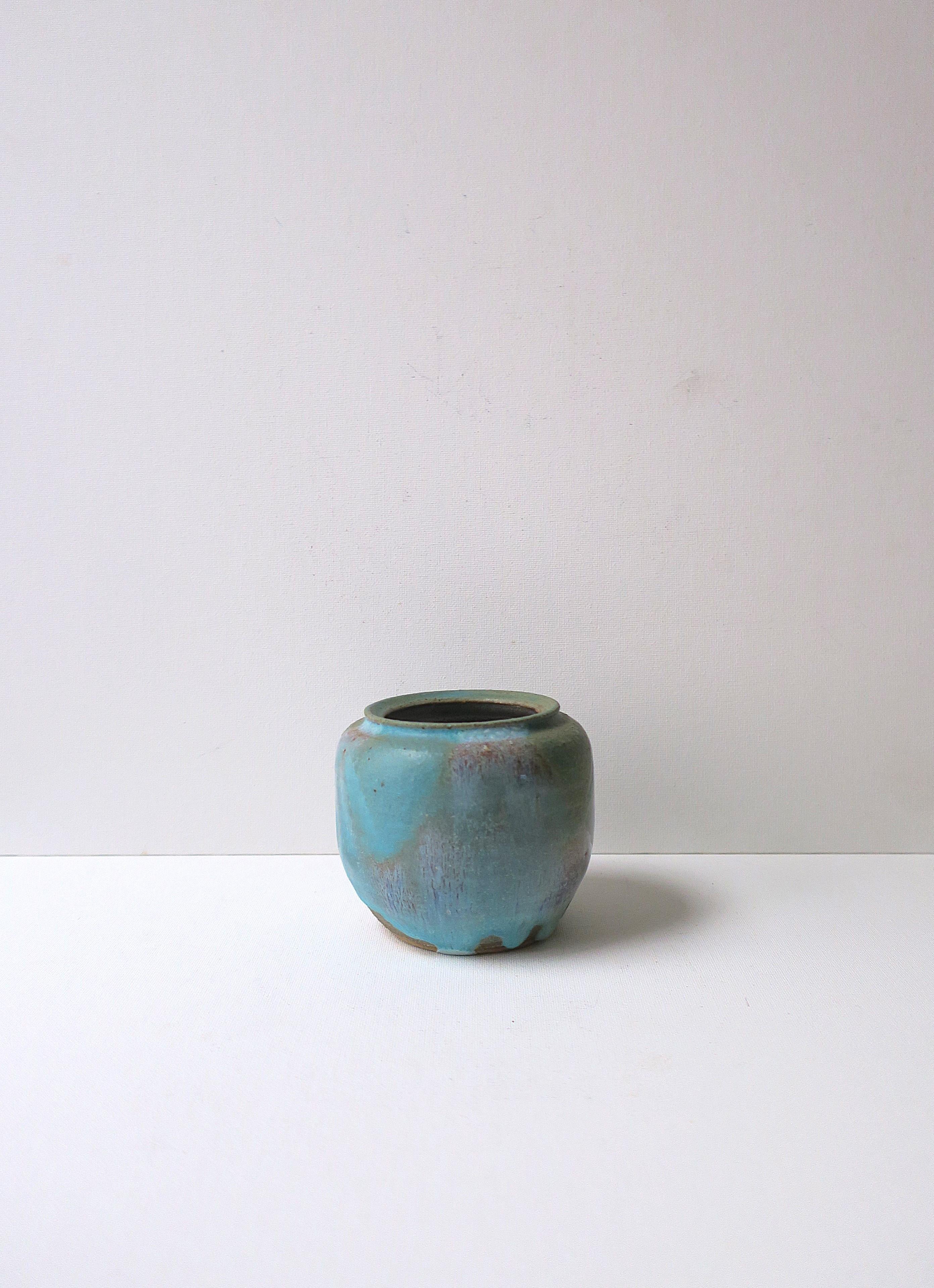 A blue drip pottery vase by artist Anne Scher, 1973, USA. Vase is predominantly turquoise blue hues with a little green, part matte, part glazed, signed and dated by artist on underside as shown in last image. Excellent condition as shown in images