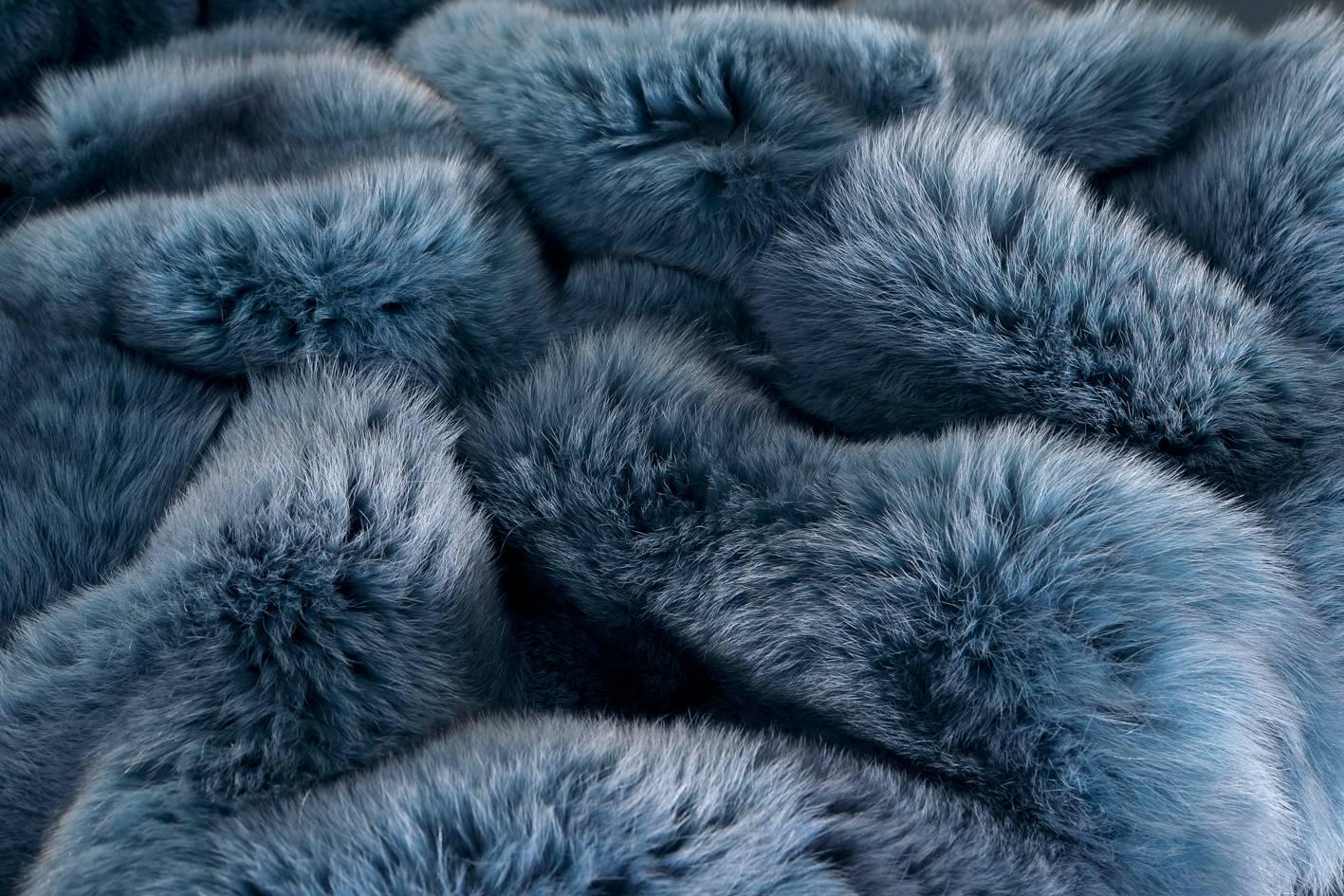 Fur throw – 150 x 200 cm
Arctic fox fur dyed in blue
Silk lining
Fur origin Finland.
 