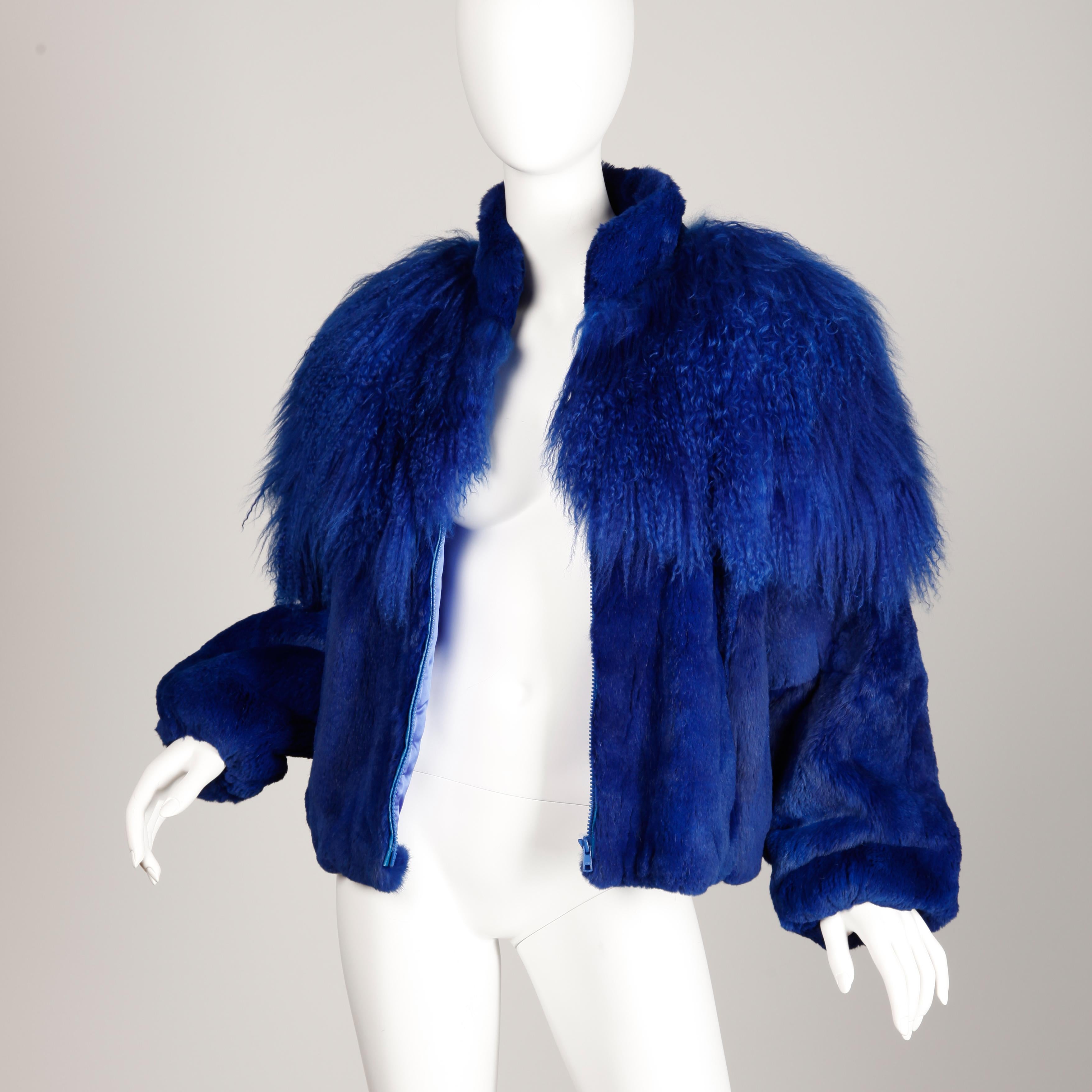 Vintage 1980s dyed cobalt blue fur bomber jacket in sheared rabbit and Mongolian lamb by Élan from the estate of Pamela Lewis (Jerry Lewis/ Gary Lewis). Fully lined with front zip closure. Elastic sleeve cuffs and waistband. The marked size is
