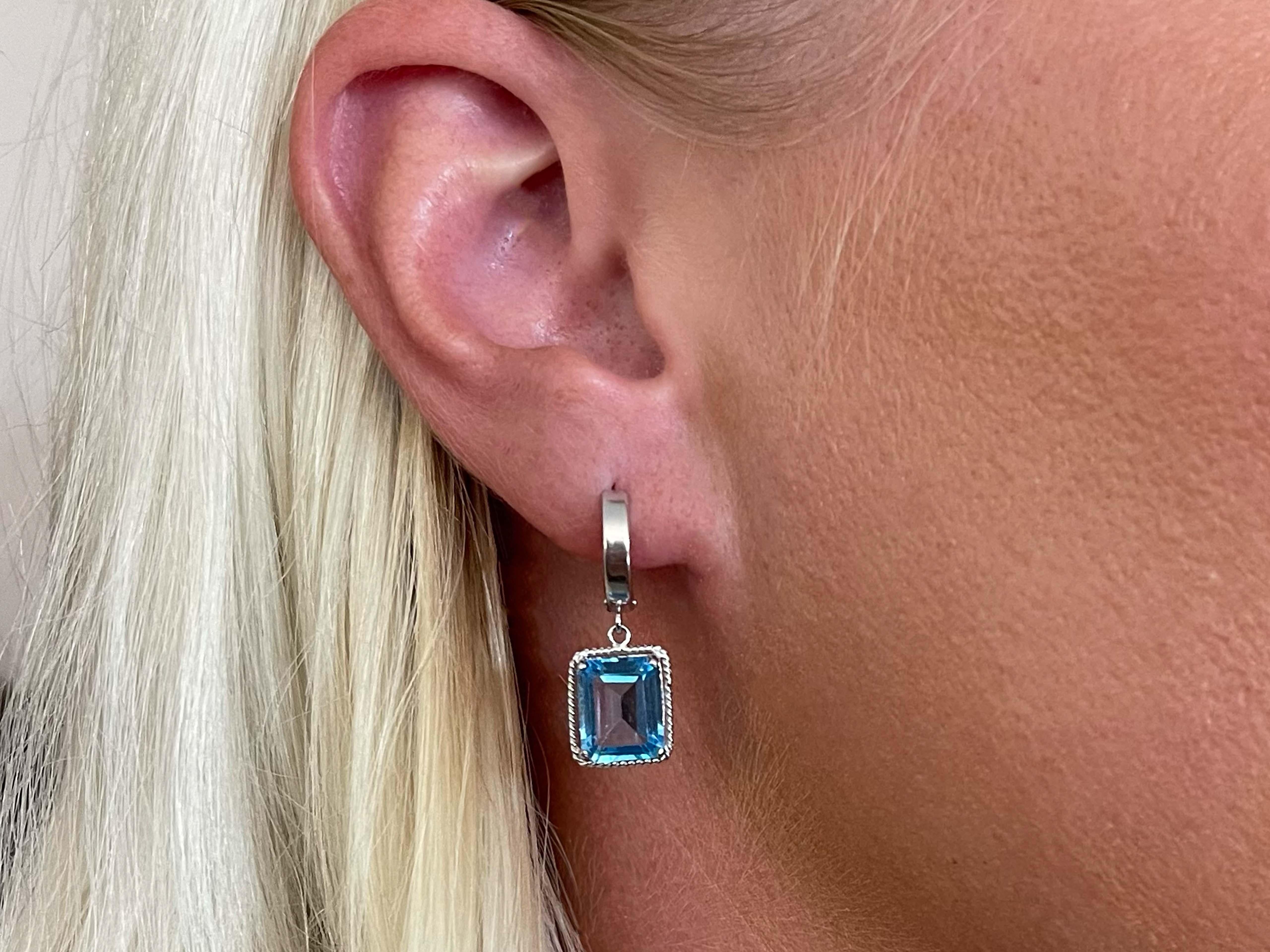 Earrings Specifications:

Metal: 14K White Gold

Total Weight: 3.5 Grams

Gemstone: Blue Topaz

Gemstone Measurements: 10 x 8 x 4.7 mm
​
​Earring Length: ~1.10