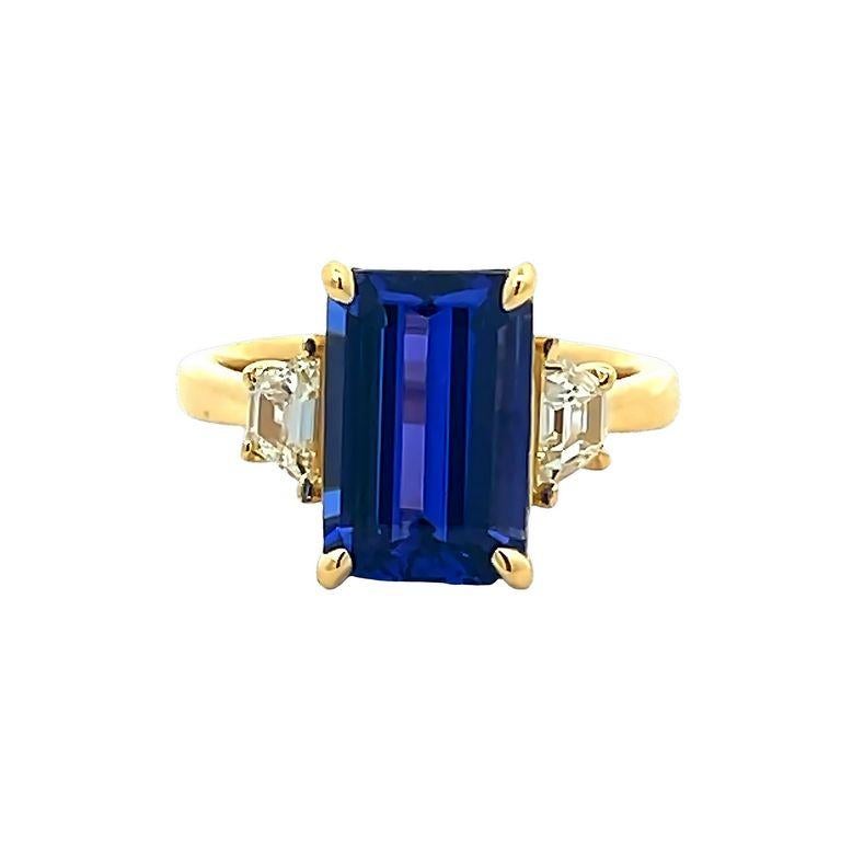 Emerald Cut Blue Emerald Tanzanite 4.40CT & Traps White Diamonds 0.39CT Ring in 18K Gold For Sale