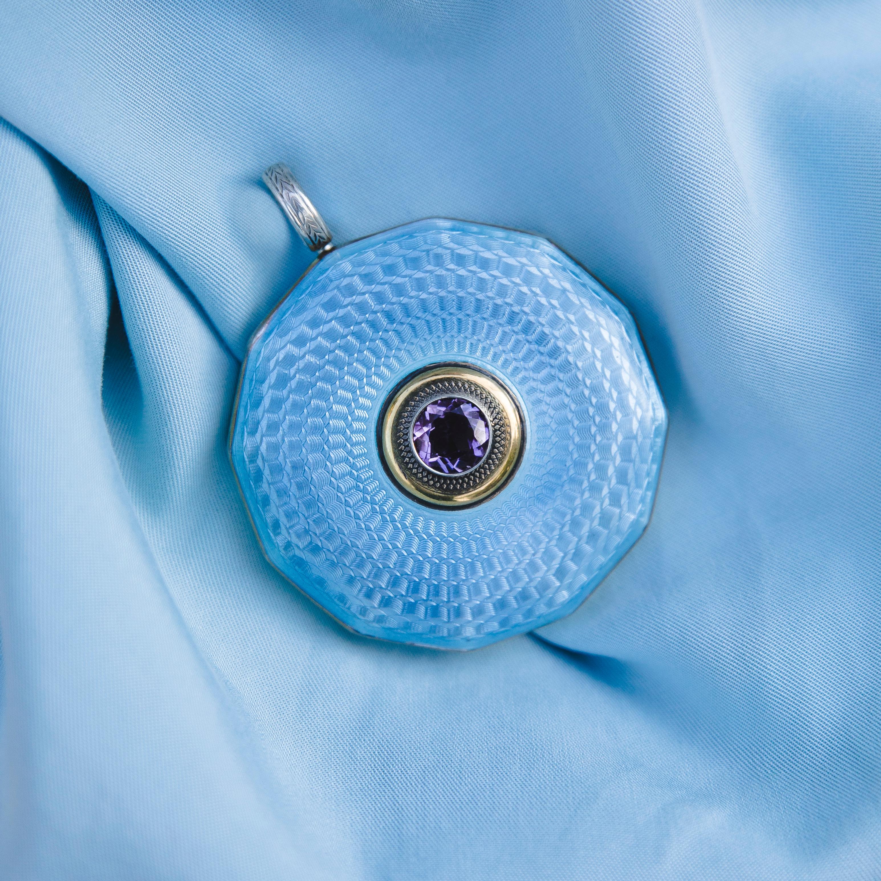 Huge antique pendant. Silver with Gold. A fine and unusual present!
Superb deep coloured Amethyst. 
The main feature of this massive pendant is the light blue enamel. 
19th century. Stamped 900 Silver. 

Very rare and outstanding item. It will be a