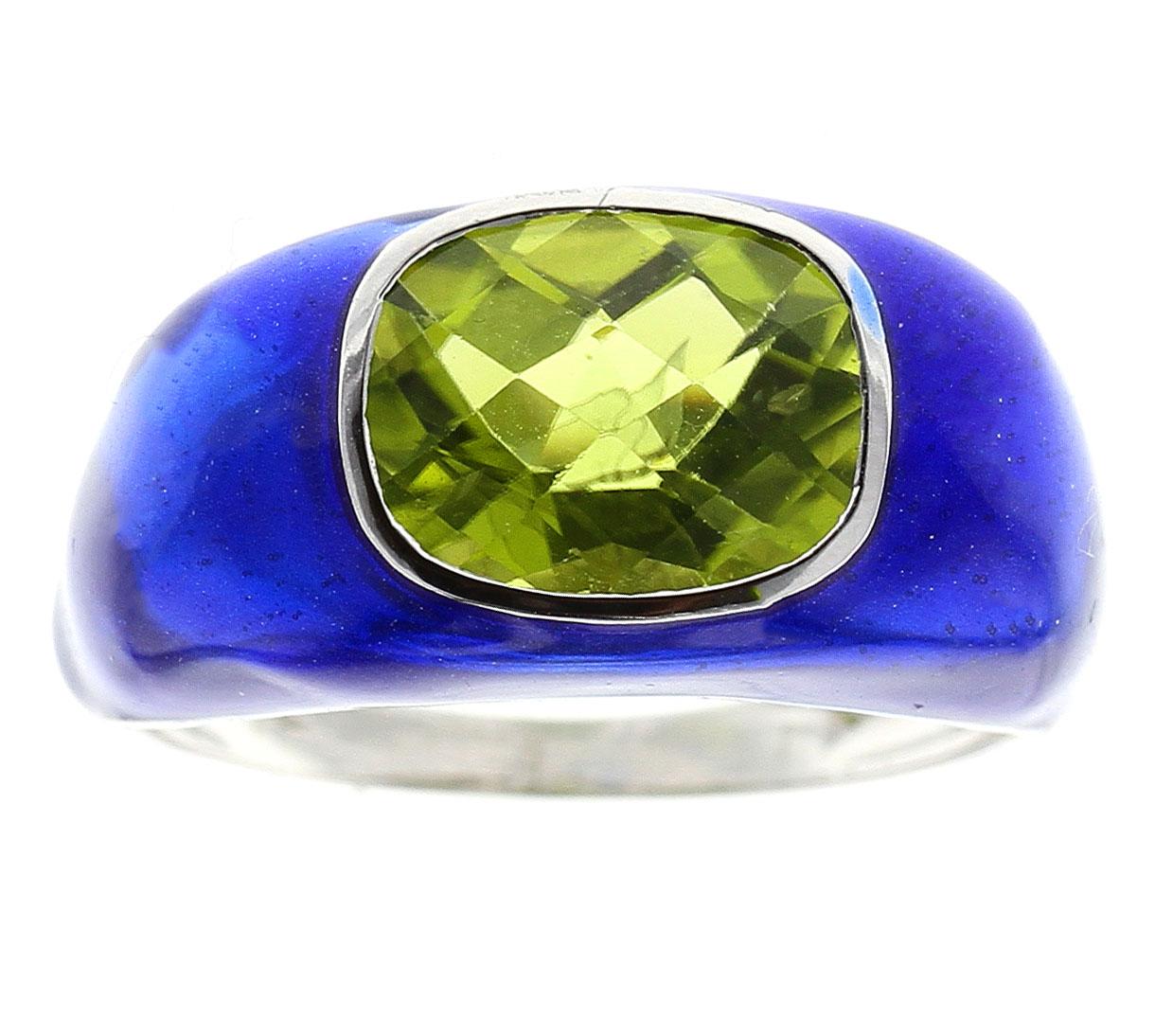 A bold Peridot Ring with Blue Enamel and 14K White Gold. The green peridot weighs 3.07 cts. This style can be made with any color of enamel and any center stone. 
