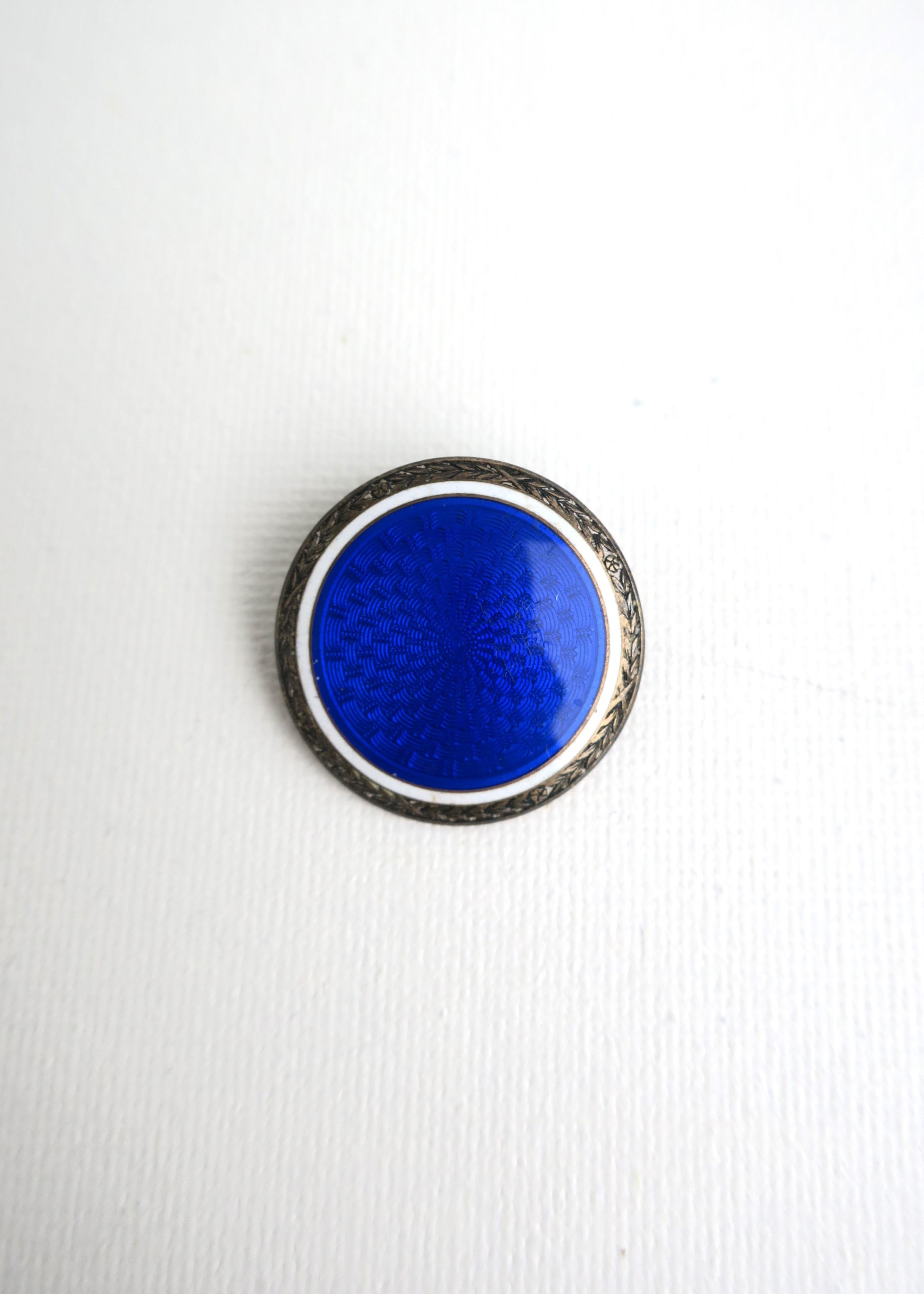 A cobalt blue Guilloche enamel and sterling silver pin brooch, circa 19th to early-20th centuries, Europe (likely France.) Piece is well made. Diameter: 1