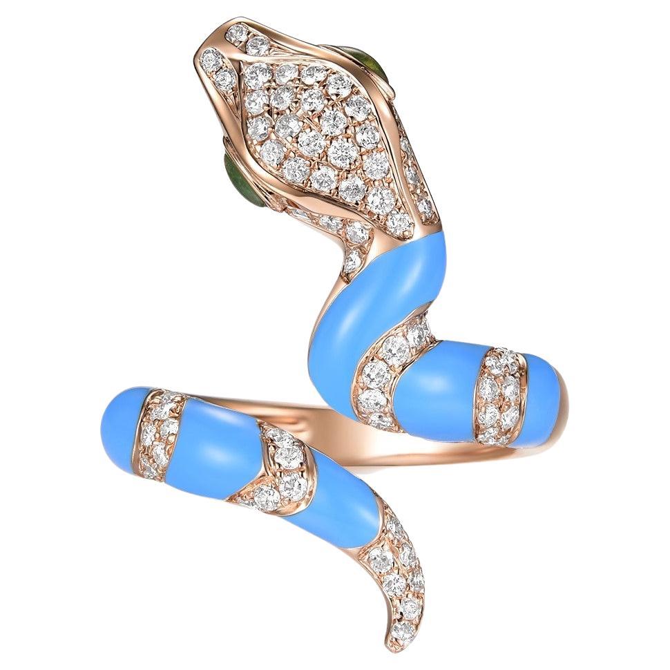 This stunning snake ring features 0.5 carat of white round diamonds, the body is covered with turquoise color enamel. The eyes of the ring is set with green jade. The snake can be customized in any color or stones. Feel free to contact me for