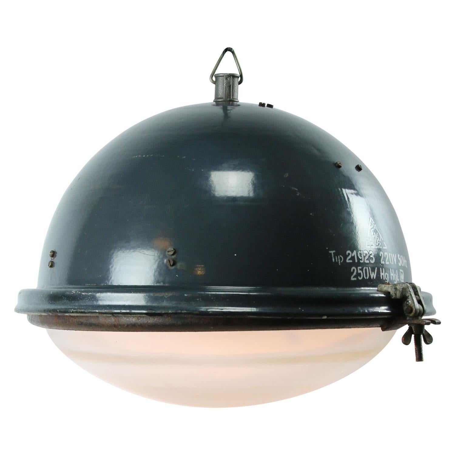 Factory pendant. Blue enamel white interior. Cast iron hook.
Clear glass.

Weight: 5.50 kg / 12.1 lb

Priced per individual item. All lamps have been made suitable by international standards for incandescent light bulbs, energy-efficient and LED