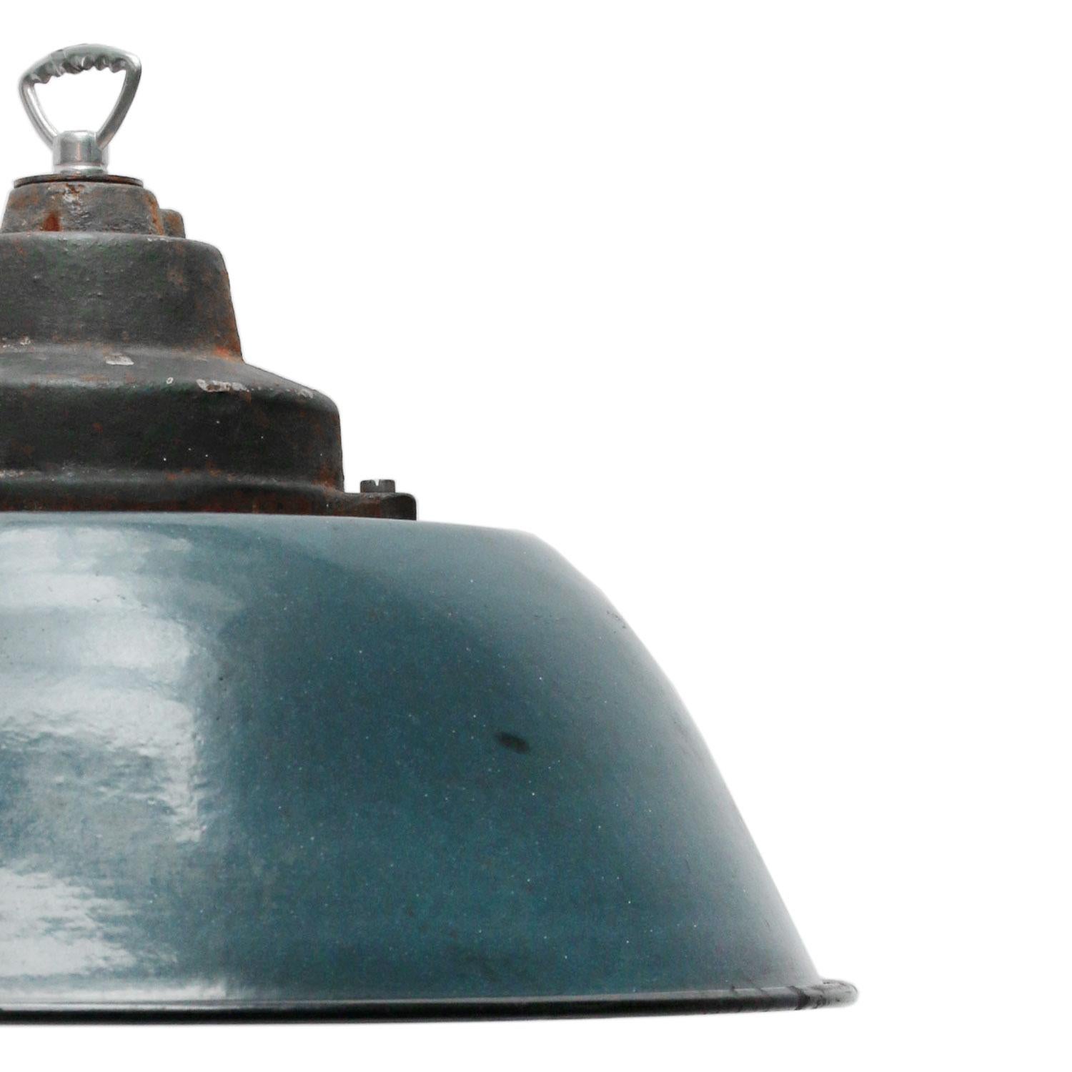 Factory pendant. Blue enamel with white interior. Cast iron top.

Weight: 3.2 kg / 7.1 lb

Priced per individual item. All lamps have been made suitable by international standards for incandescent light bulbs, energy-efficient and LED bulbs.