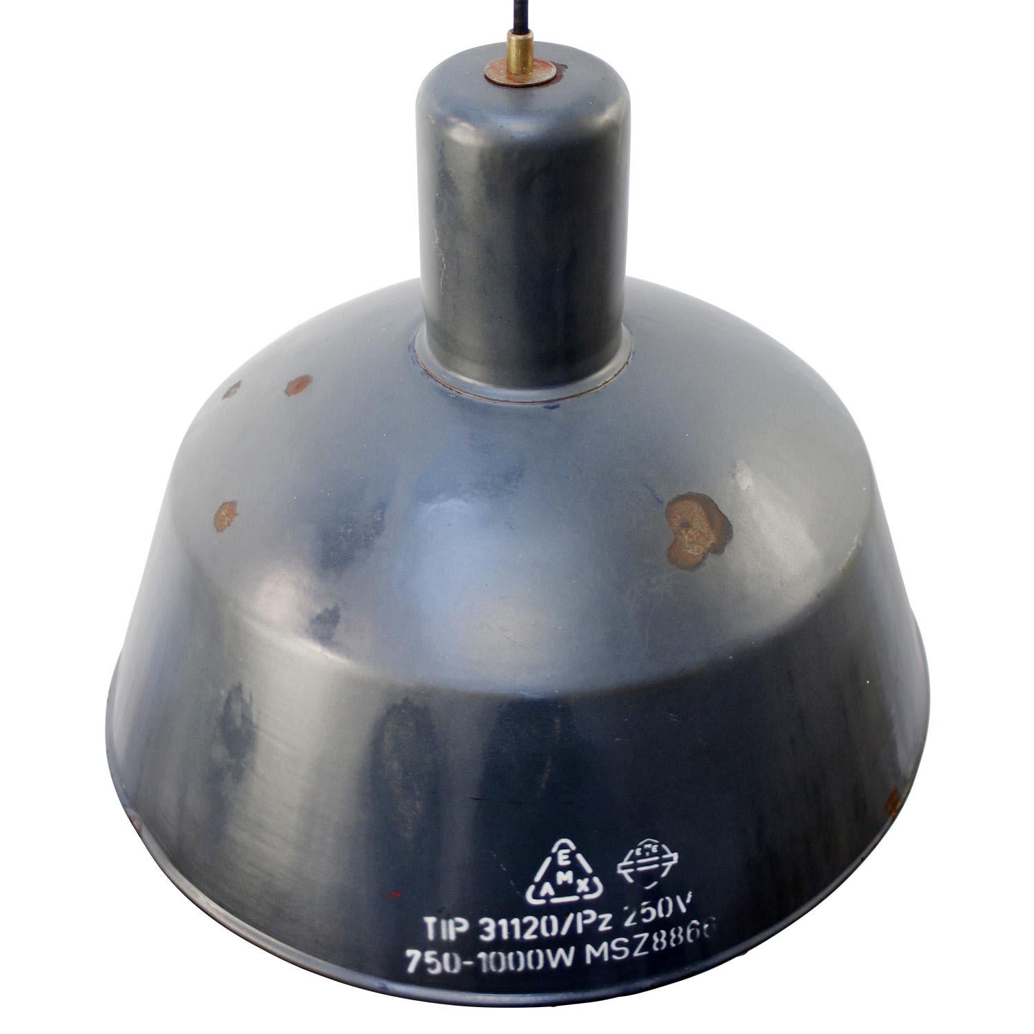 Factory hanging light
blue enamel, white interior

Measures: weight: 2.75 kg / 6.1 lb

Priced per individual item. All lamps have been made suitable by international standards for incandescent light bulbs, energy-efficient and LED bulbs. E26/E27