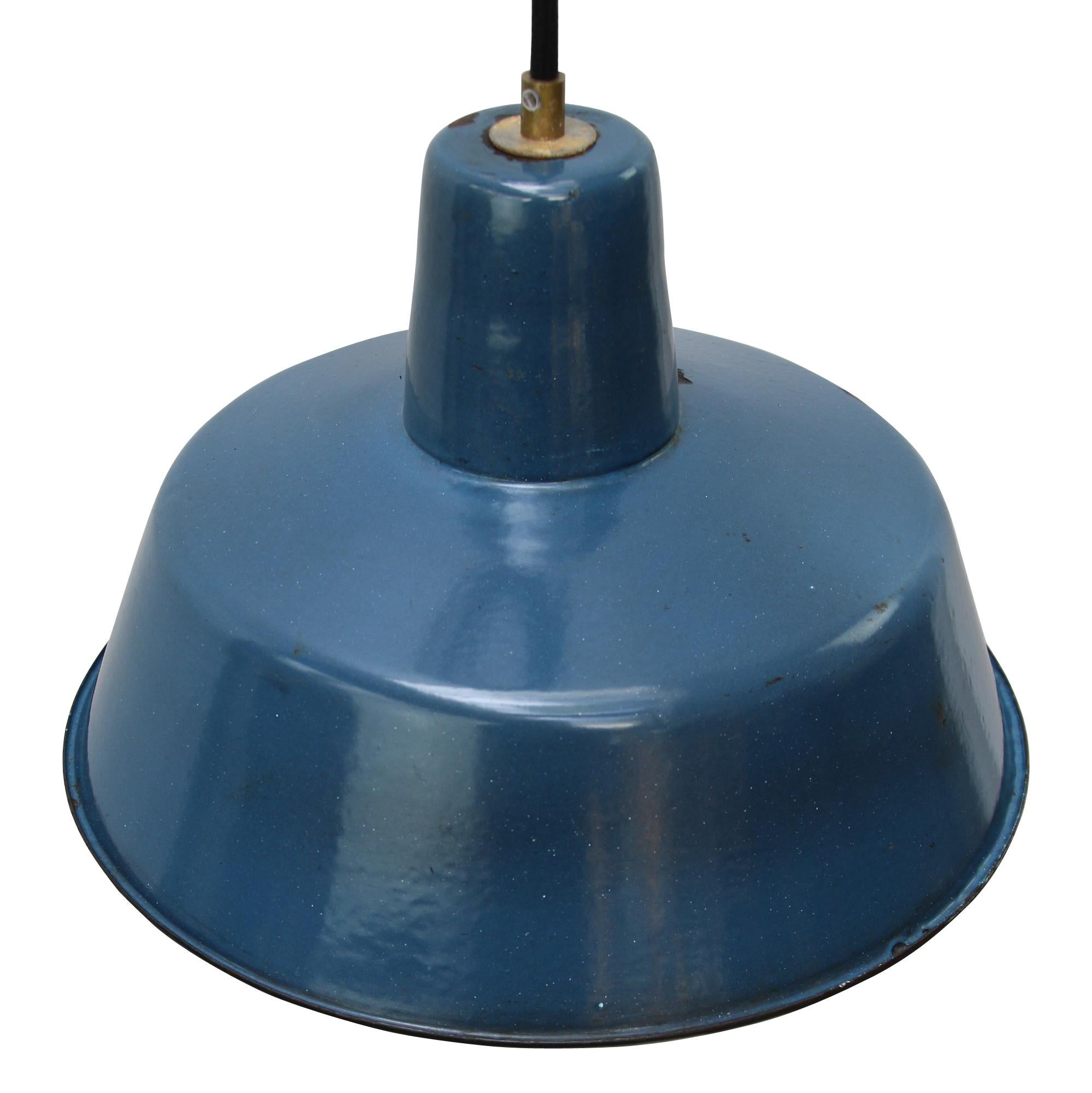 Vintage industrial pendant.
Blue enamel with white interior.

Weight: 1.3 kg / 2.9 lb.

Priced per individual item. All lamps have been made suitable by international standards for incandescent light bulbs, energy-efficient and LED bulbs.