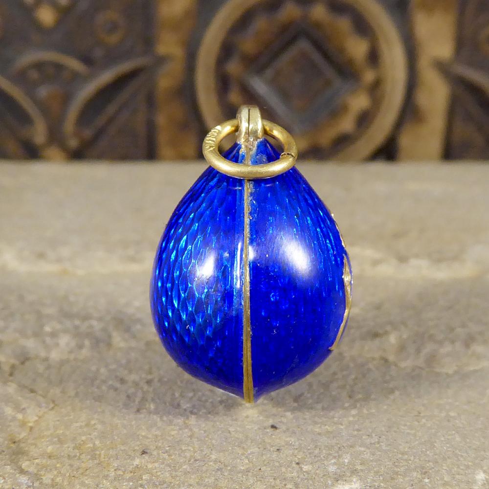 This lovely blue guilloche enamel pendant originates from Russia. It a cute little leaf motif in silver gilt and paste stones in the centre of the front of the egg. a great vintage piece that will be great as a charm or pendant. 

Condition: Very