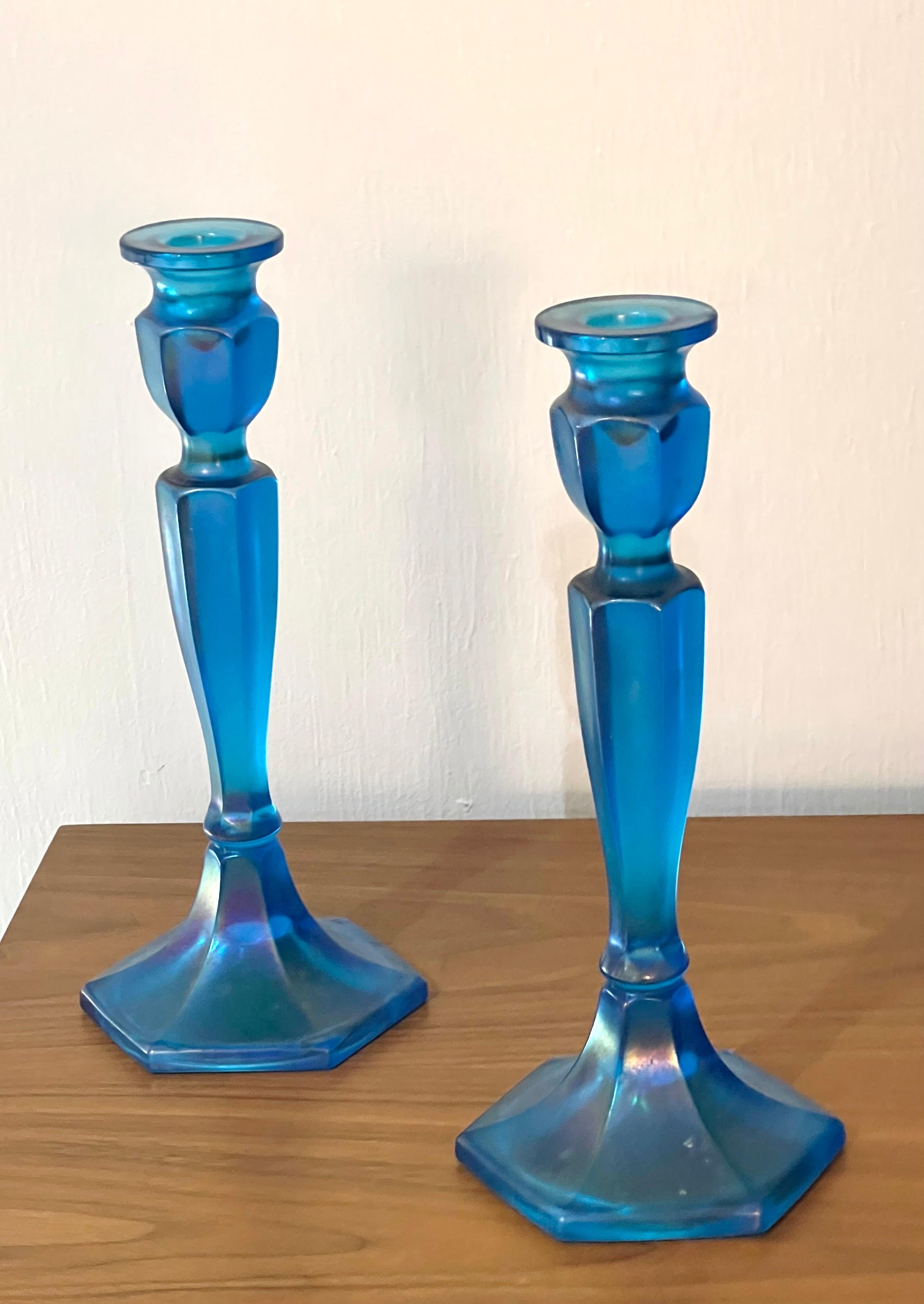 A pair of blue Favrile glass candlesticks. Reminiscent of Tiffany’s glass.