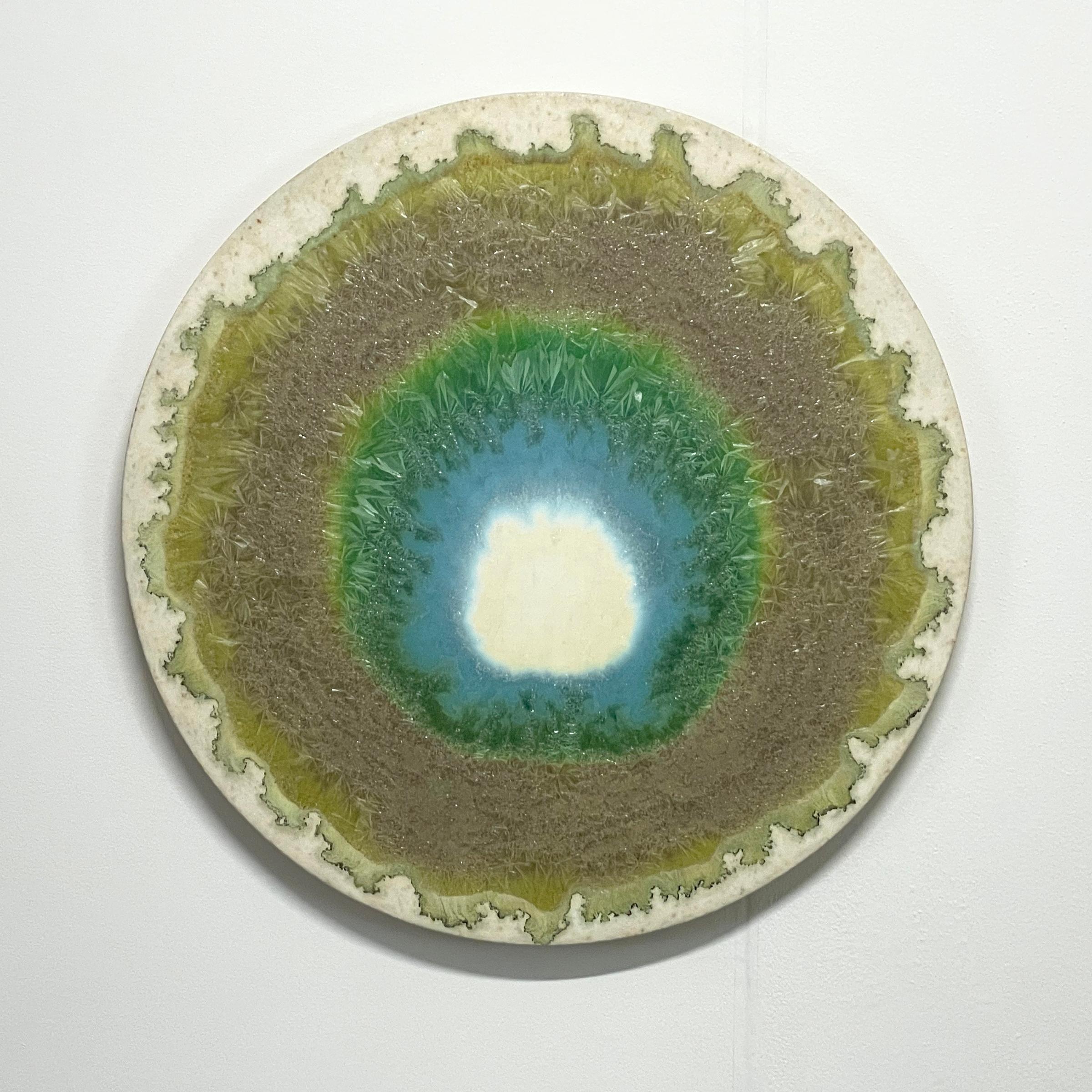 Blue Flame
Ceramic painting by William Edwards
Hand rolled earthenware circular slab with crystalline glaze. 

William received his BFA in sculpture from the historic San Francisco Art Institute and his MFA from UC Davis. William produces hand made,