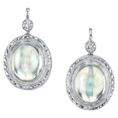 Blue Flash Moonstone and Diamond Drop Earrings in Hand Engraved White Gold