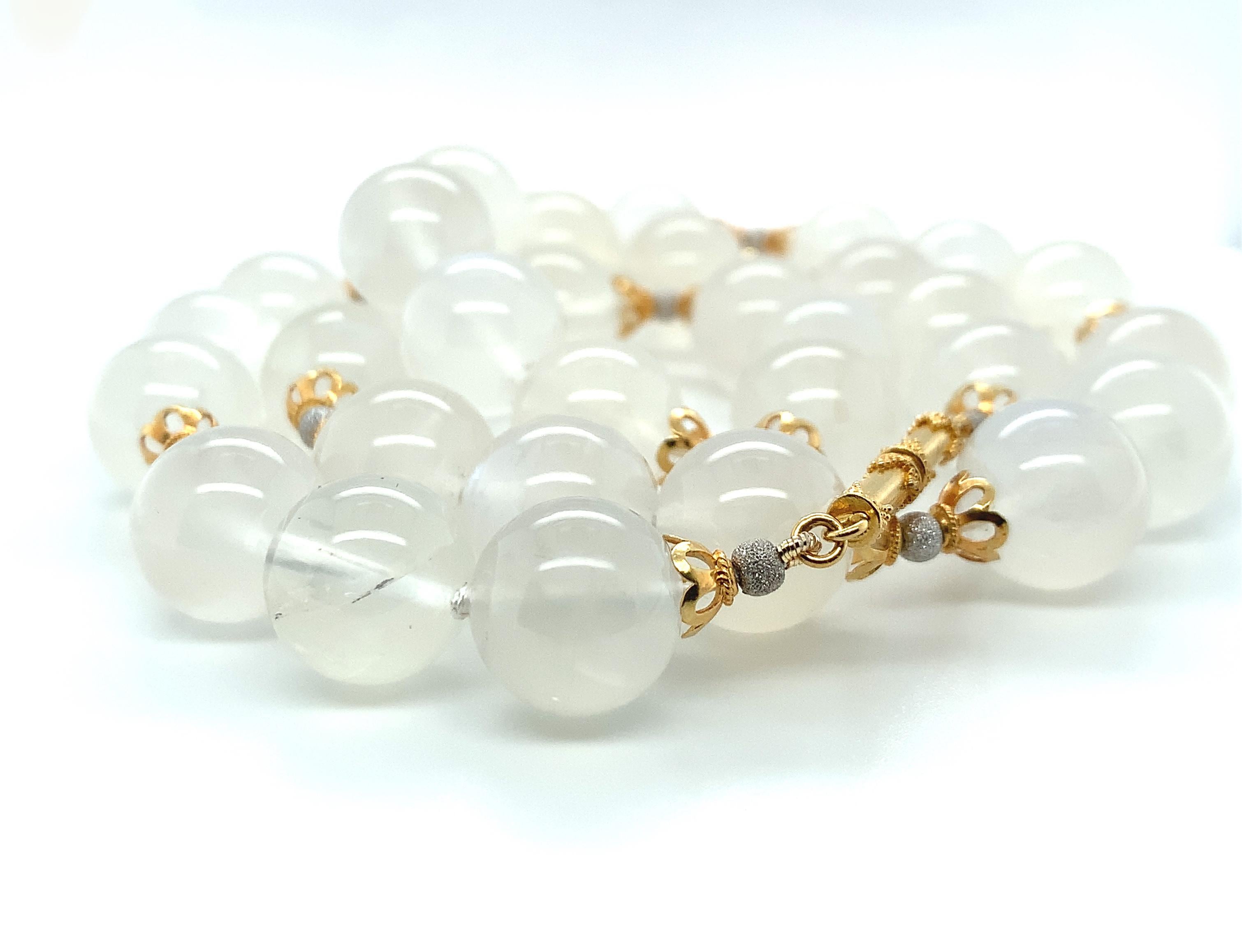 This pretty strand of blue flash moonstone beads will make such a versatile and fresh addition to your jewelry wardrobe! The 12mm beads are beautifully matched and exhibit striking 