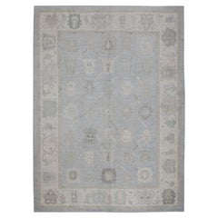 Blue Floral Design Handwoven Wool Turkish Oushak Rug 10
2" X 14
