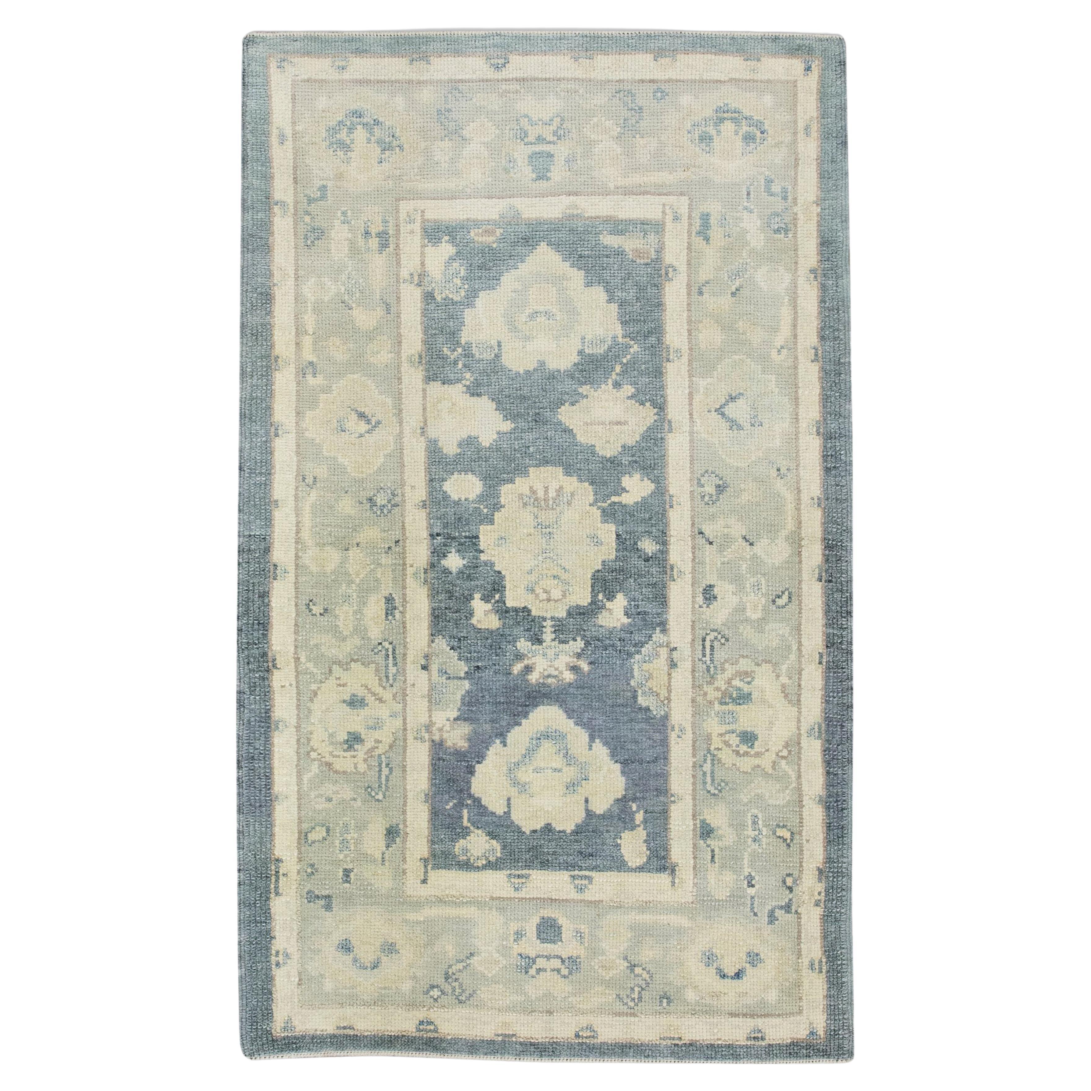 Blue Floral Design Handwoven Wool Turkish Oushak Rug For Sale