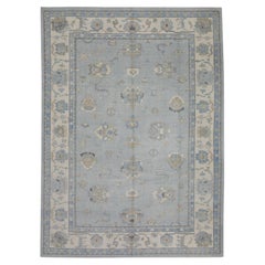 Türkischer Oushak-Teppich aus handgewebter Wolle mit blauem Blumenmuster 8'8" X 12'1"