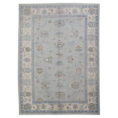 Tapis turc Oushak en laine à motifs floraux bleus tissés à la main 9'10" X 13'7".