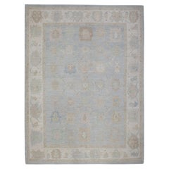 Türkischer Oushak-Teppich aus handgewebter Wolle mit blauem Blumenmuster 9'9" X 13'1"