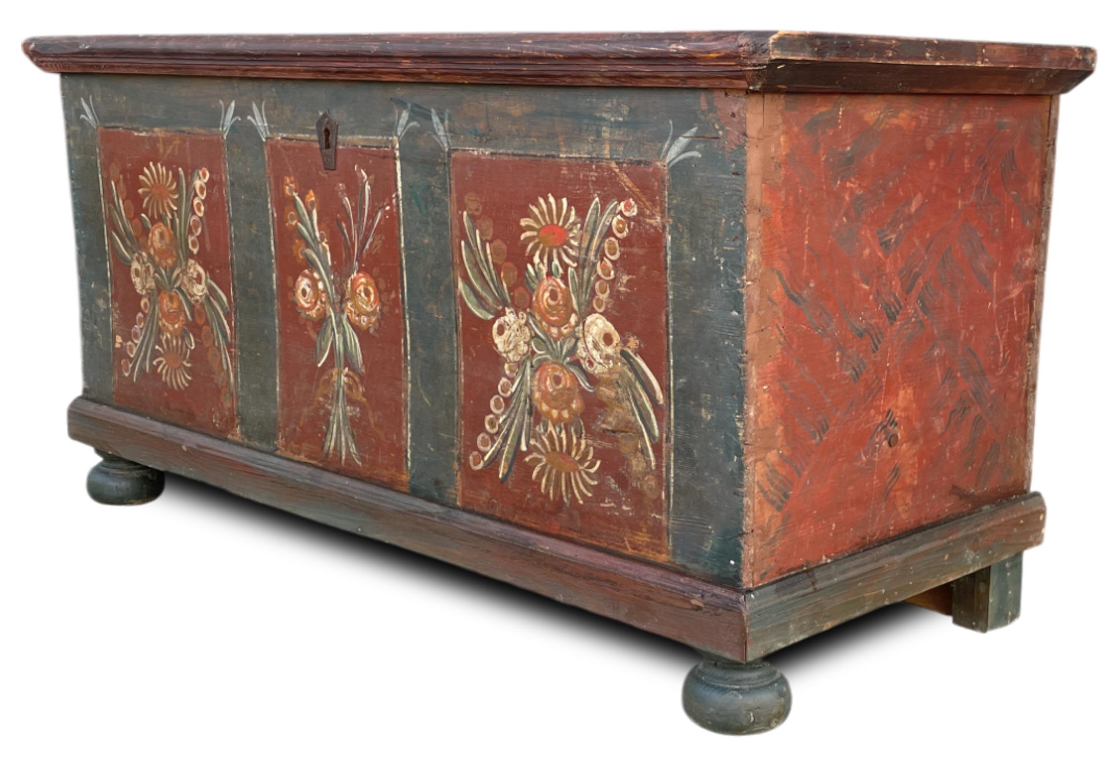 Alpine Blue Flowered Painted Chest

Measurements: H. 57 cm - W. 114 cm - D. 50 cm
Period: about 1850
Origin: Tyrol
Wood: Fir

Description:
Tyrolean chest, painted in blue.
On the front it has the classic division of space into three main panels,