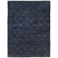 Tapis en laine et soie à motifs floraux en pochoir bleu