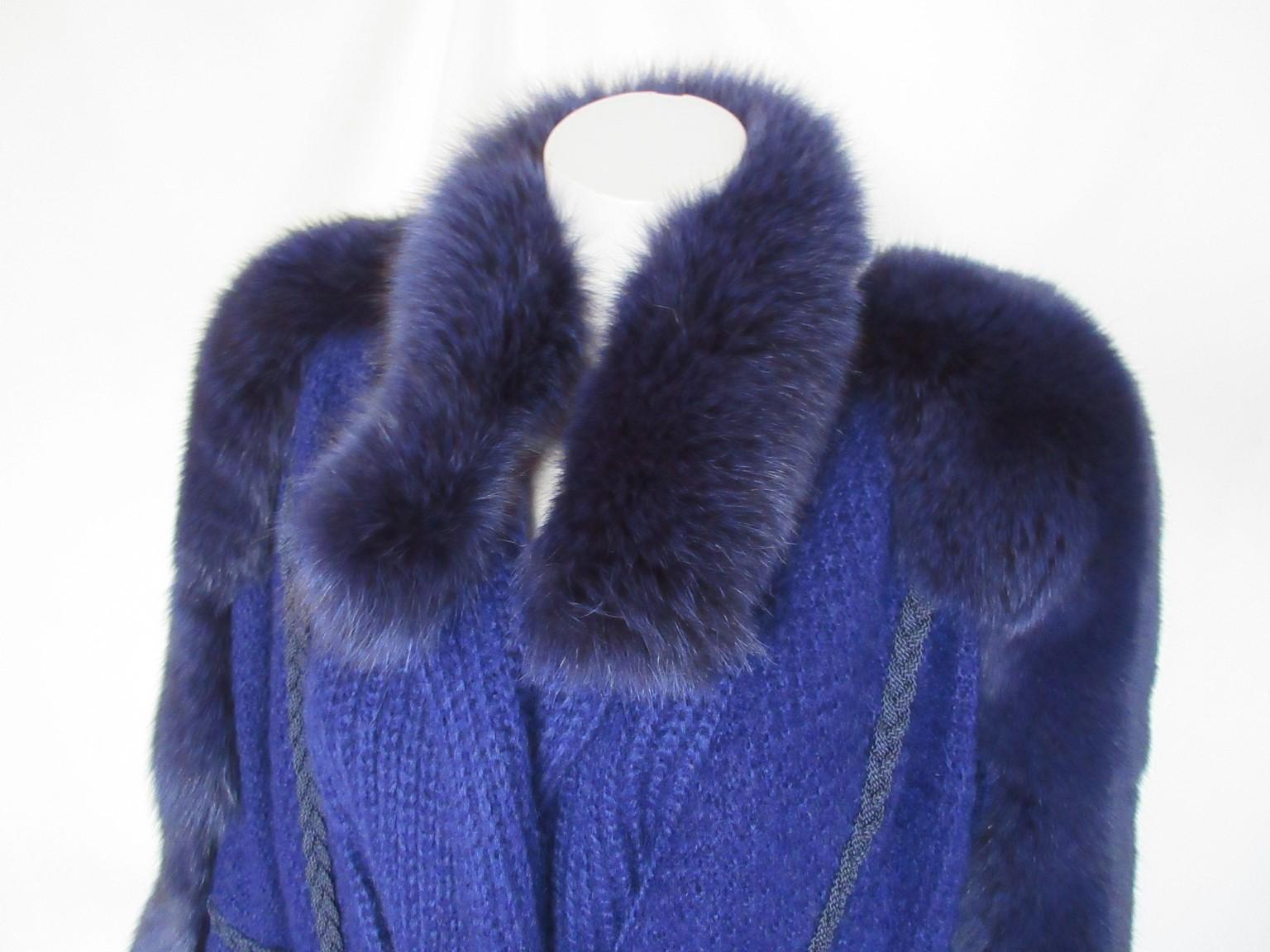 Fabulous original special blue wool coat vest trimmed with soft fox fur

We offer more exclusive fur items, view our frontstore

Details:
Blue knitted blend of lambswool/cashmere/ mohair with dyed blue fox fur
2 pockets and attached litlle closing