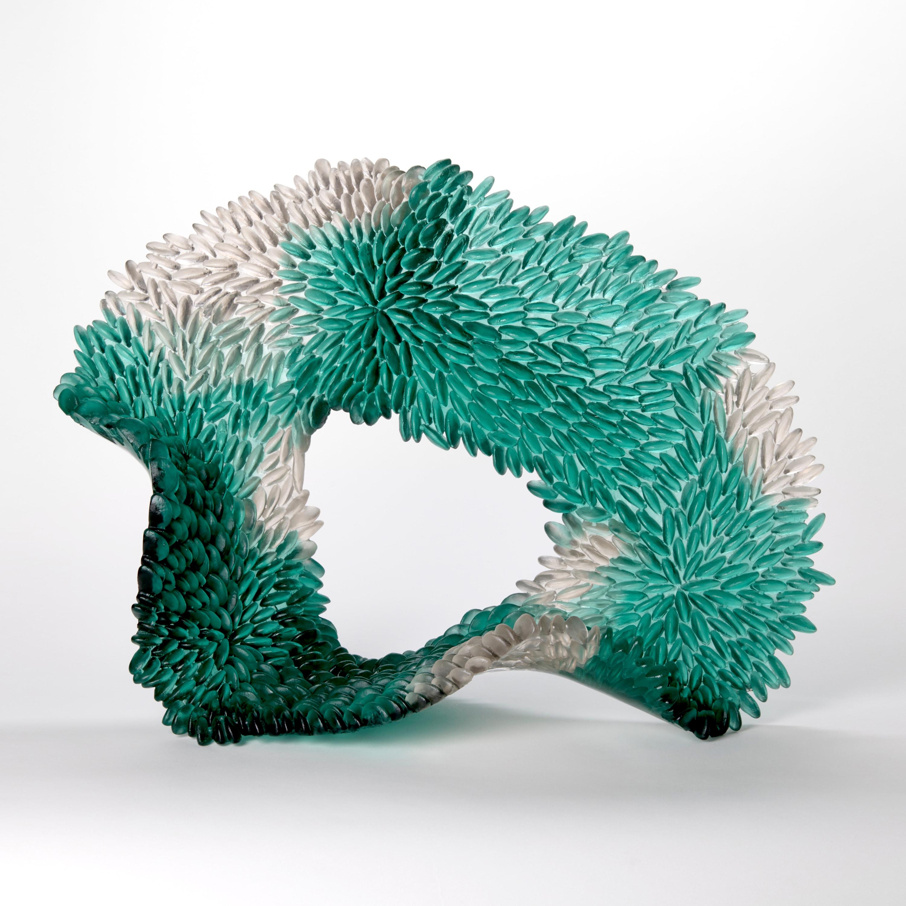 'Blue Fungi' è una scultura in vetro unica dell'artista britannica Nina Casson McGarva.

Casson McGarva getta il vetro in uno stampo piatto dove introduce tutte le texture superficiali, tutte uniche e distinte. Il vetro viene poi sottoposto a una