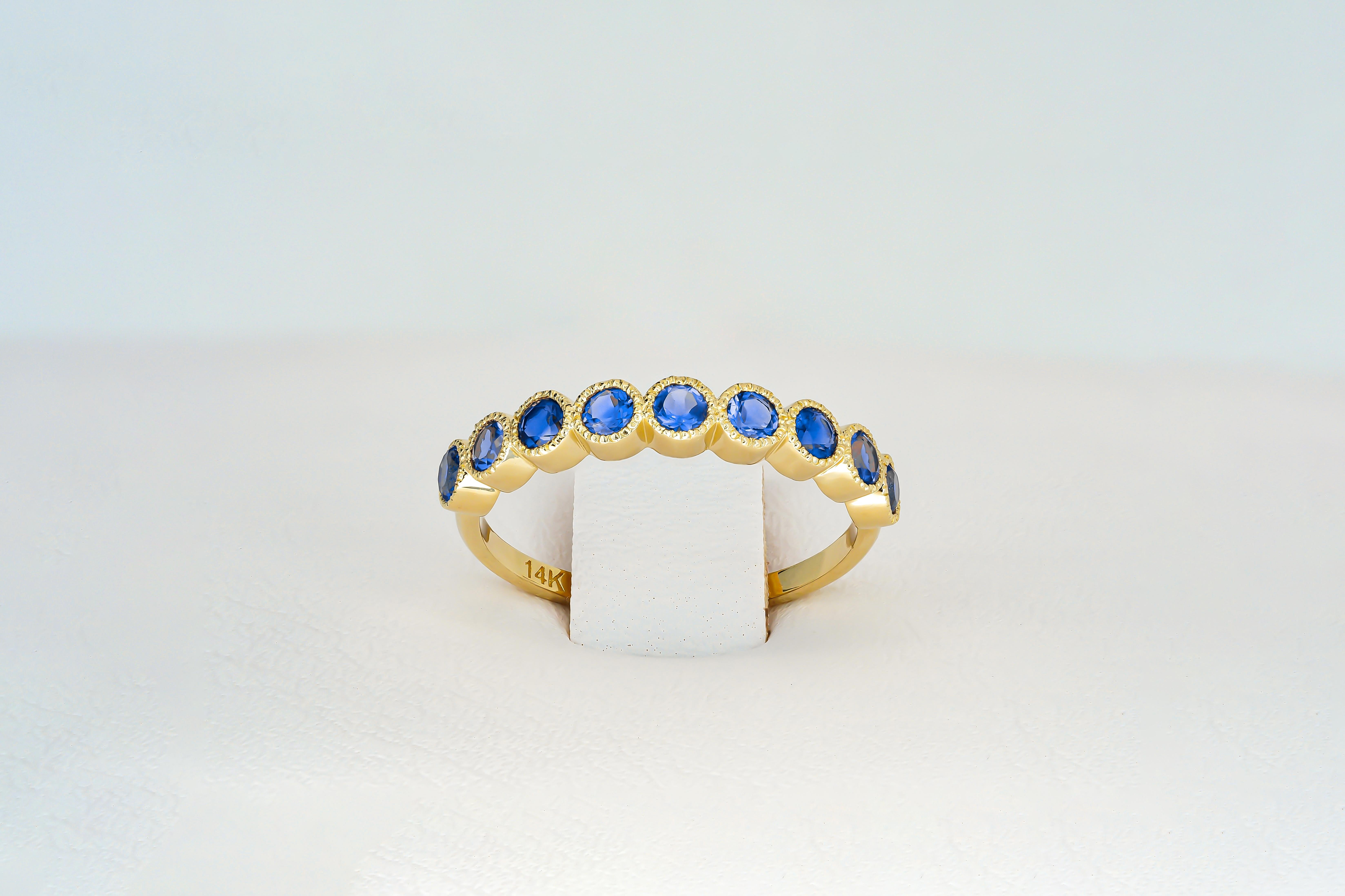 Round Cut Blue gem half eternity 14k gold ring.