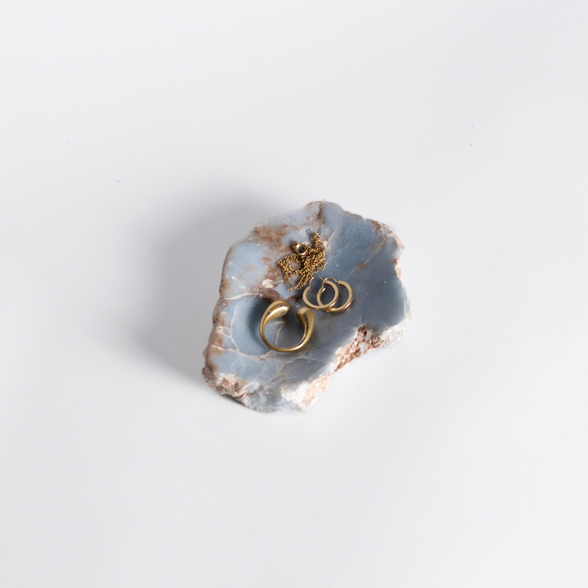 This blue angelite dish combines natural beauty and functionality for your home.

This organic catch-all dish adds a pop of the Andes to a small bathroom space, dining table, dressers and outdoor.

The dish is carved following natural shape of the