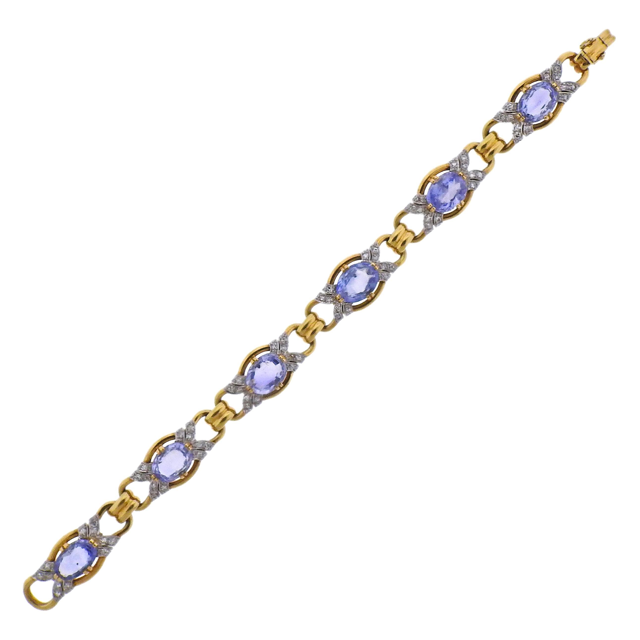 Bracelet en or avec diamants et pierres bleues en vente